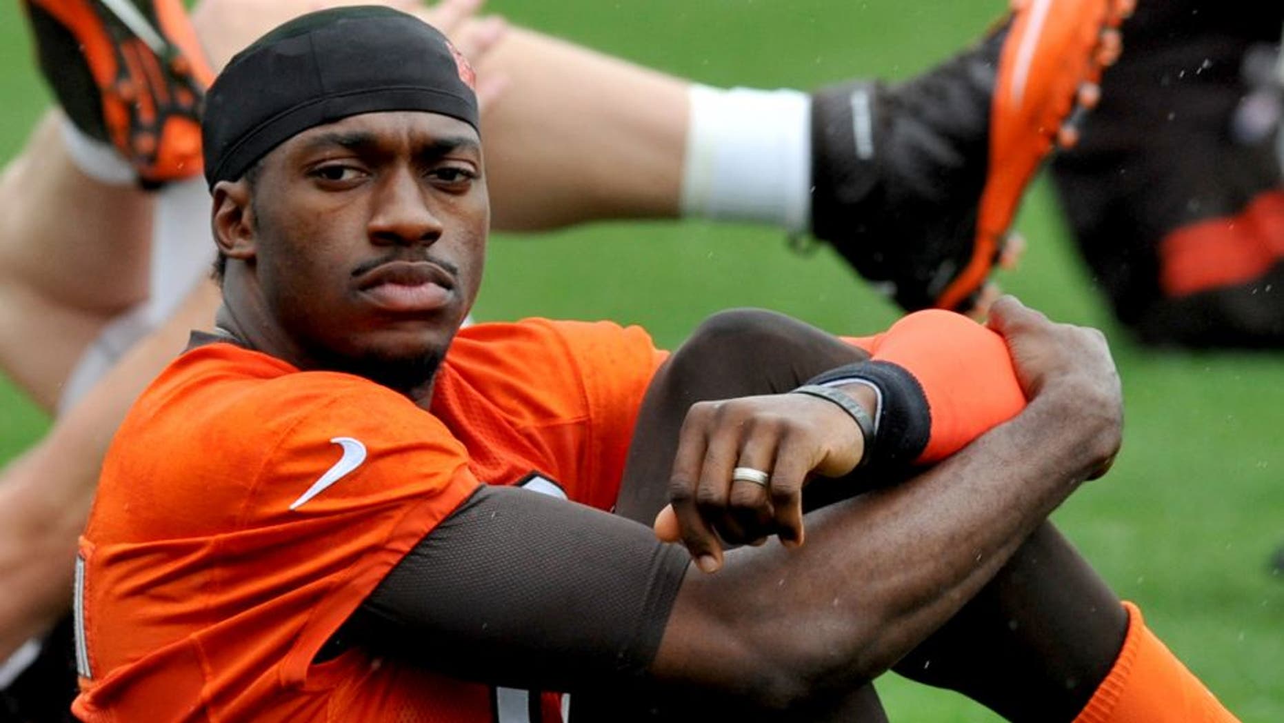 BEREA, OH - APRIL 21, 2016: Quarterback Robert Griffin III #10 of the Cleveland Browns stretches during a voluntary mini camp on April 21, 2016 at the Cleveland Browns training facility in Berea, Ohio. (Photo by Nick Cammett/Diamond Images/Getty Images)