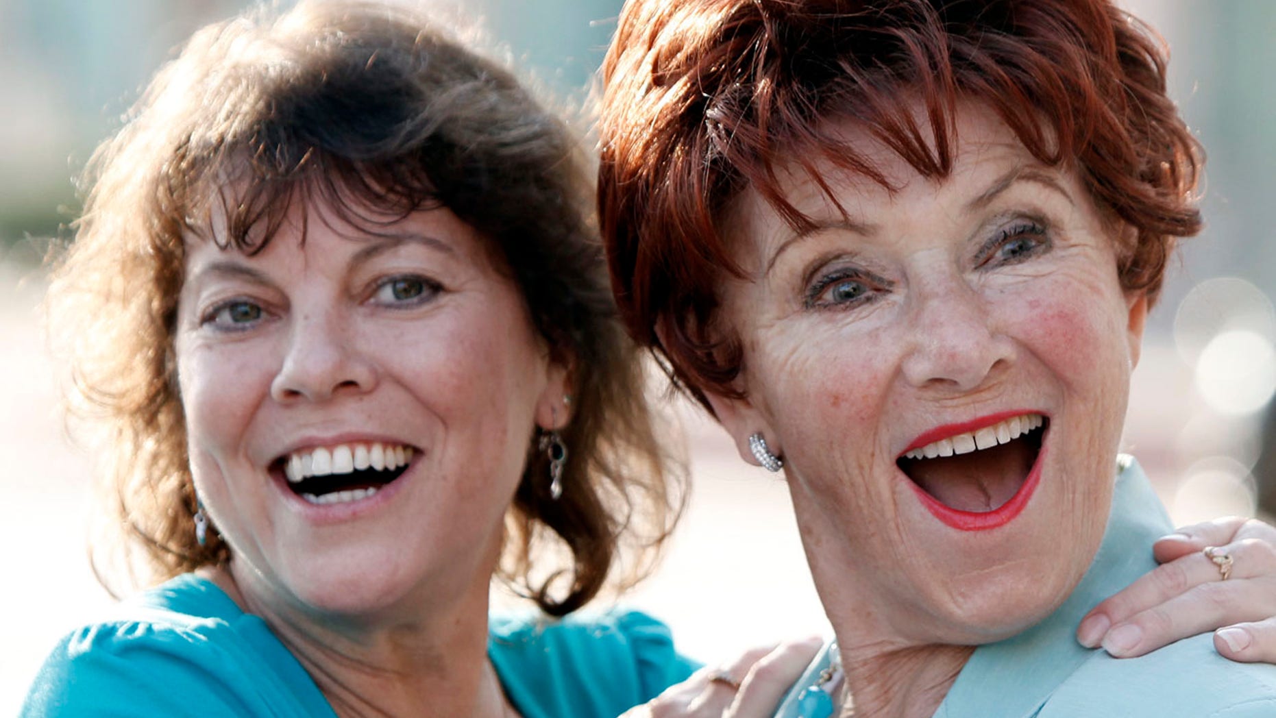 FILE - In this June 18, 2009 file photo, actresses Erin Moran, left, and Marion Ross pose together at the Academy of Television Arts and Sciences' "A Father's Day Salute to TV Dads" in the North Hollywood section of Los Angeles.