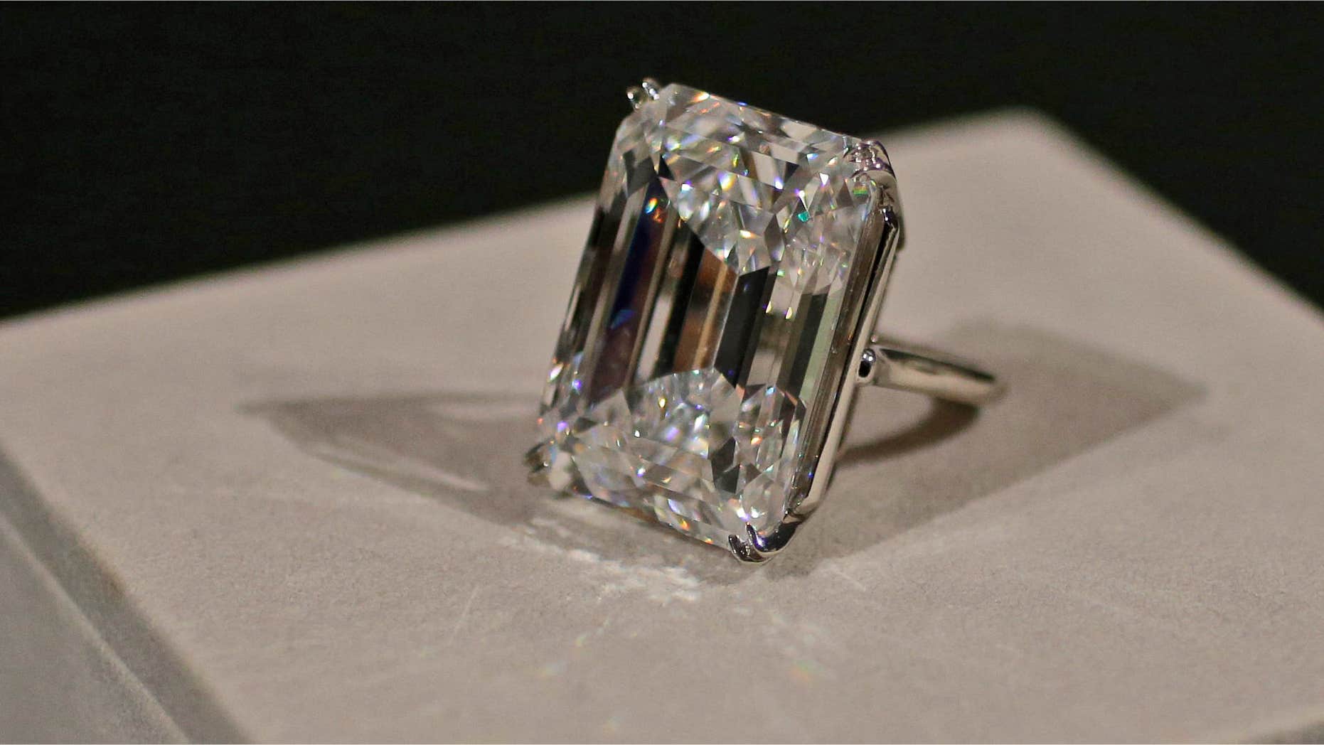 April 17, 2015: A 100-carat emerald-cut diamond is on display at Sotheby's.