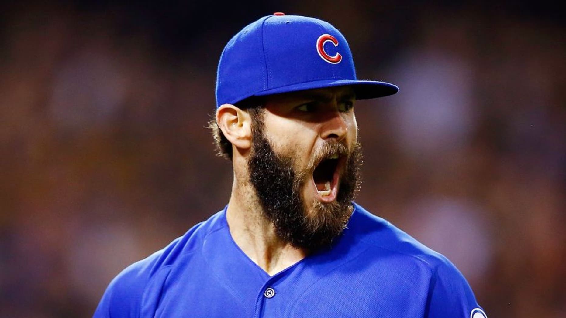PITTSBURGH, PA - OCTOBER 07: Jake Arrieta #49 of the Chicago Cubs reacts after a double play to end the sixth inning with the bases loaded during the National League Wild Card game against the Pittsburgh Pirates at PNC Park on October 7, 2015 in Pittsburgh, Pennsylvania. (Photo by Jared Wickerham/Getty Images)