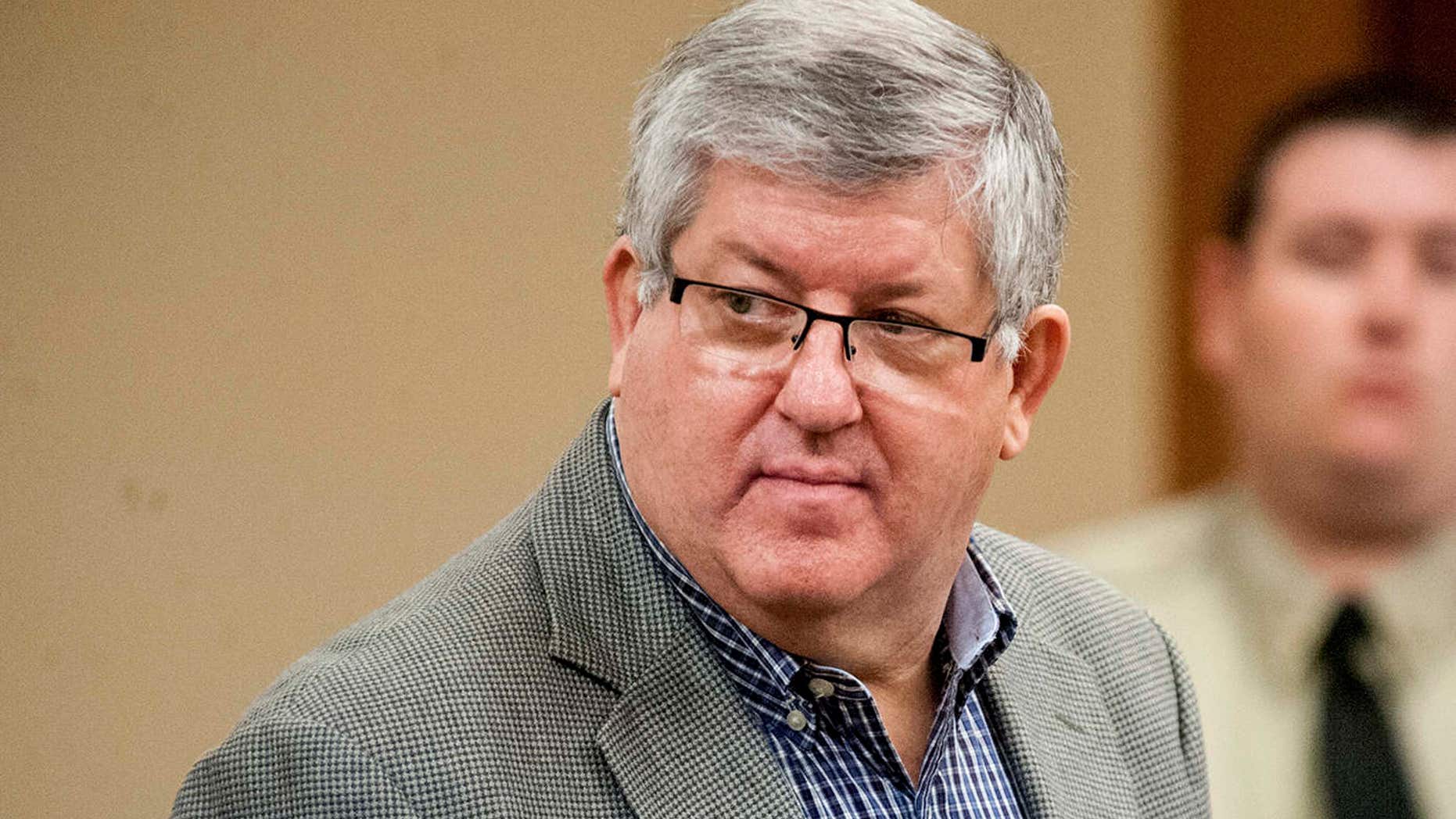 Bernie Tiede, left, stands in court during day nine of his new sentencing trial, on Monday, April 18, 2016, at the Rusk County Justice Center in Henderson, Texas.
