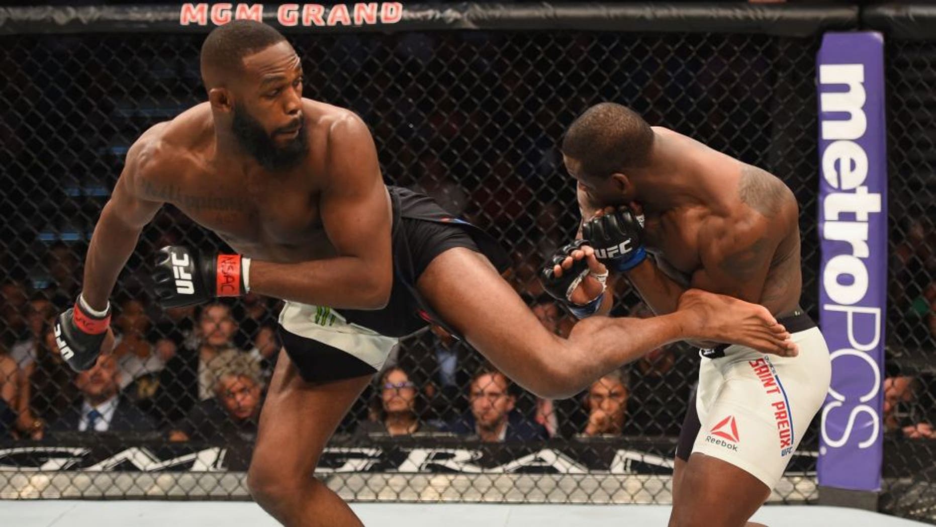 LAS VEGAS, NV - APRIL 23: (L-R) Jon Jones kicks Ovince Saint Preux in their interim UFC light heavyweight championship bout during the UFC 197 event inside MGM Grand Garden Arena on April 23, 2016 in Las Vegas, Nevada. (Photo by Josh Hedges/Zuffa LLC/Zuffa LLC via Getty Images)