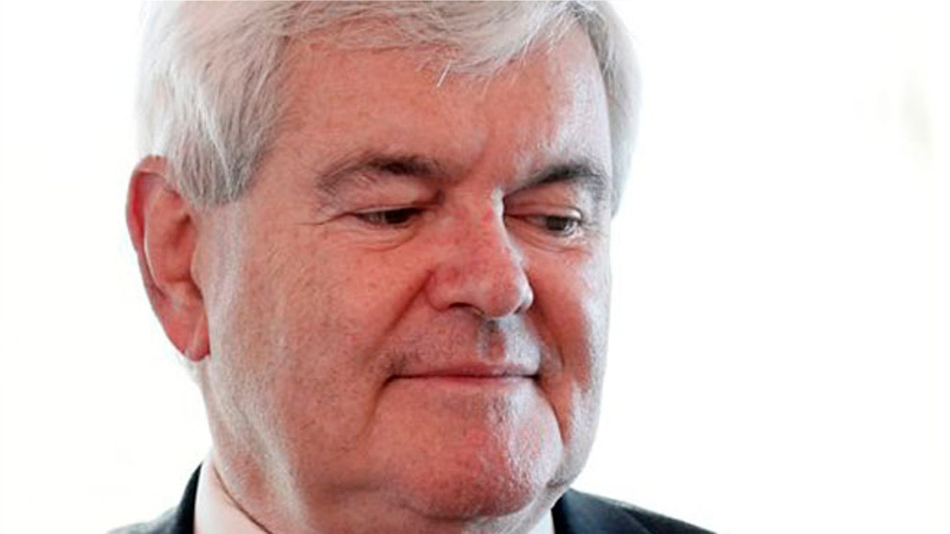 FILE -- April 12, 2012: Newt Gingrich pauses after a being a guest on a radio interview in the Hollywood Diner in Dover, Del.