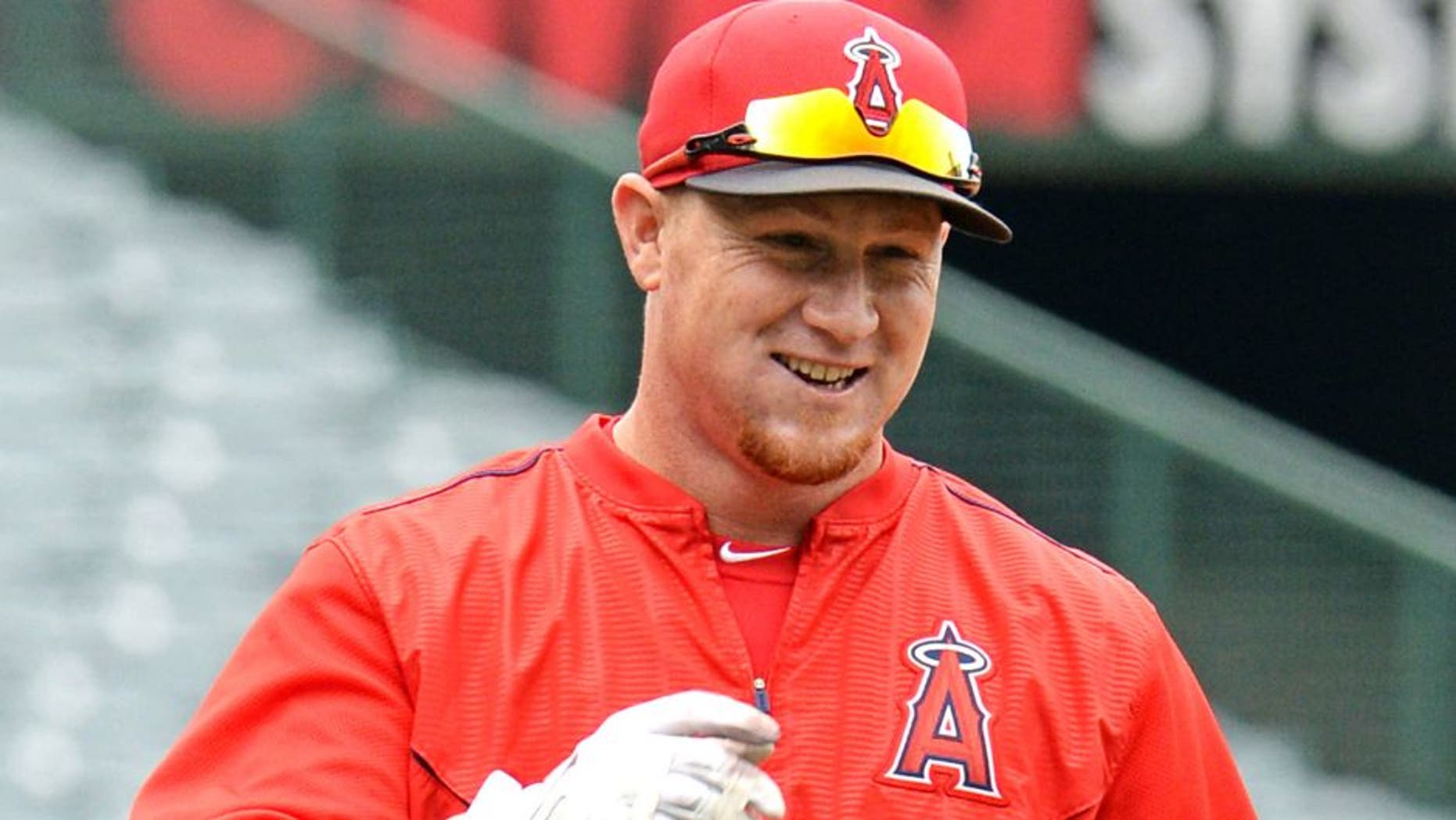 Apr 22, 2015; Anaheim, CA, USA; Los Angeles Angels right fielder Kole Calhoun (56) warms up before the game against the Oakland Athletics at Angel Stadium of Anaheim. Mandatory Credit: Jayne Kamin-Oncea-USA TODAY Sports