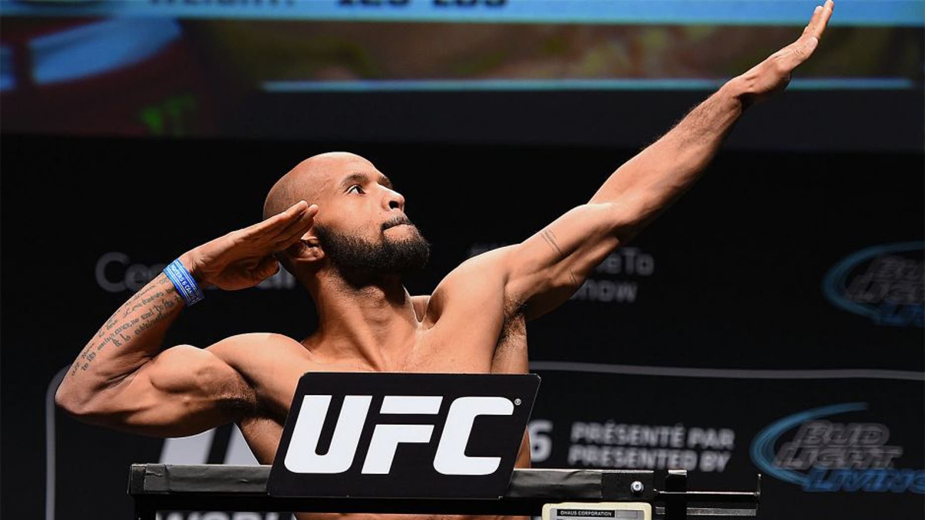 MONTREAL, QC - APRIL 24: UFC flyweight champion Demetrious Johnson of the United States weighs in during the UFC 186 weigh-in at Metropolis on April 24, 2015 in Montreal, Quebec, Canada. (Photo by Josh Hedges/Zuffa LLC/Zuffa LLC via Getty Images)