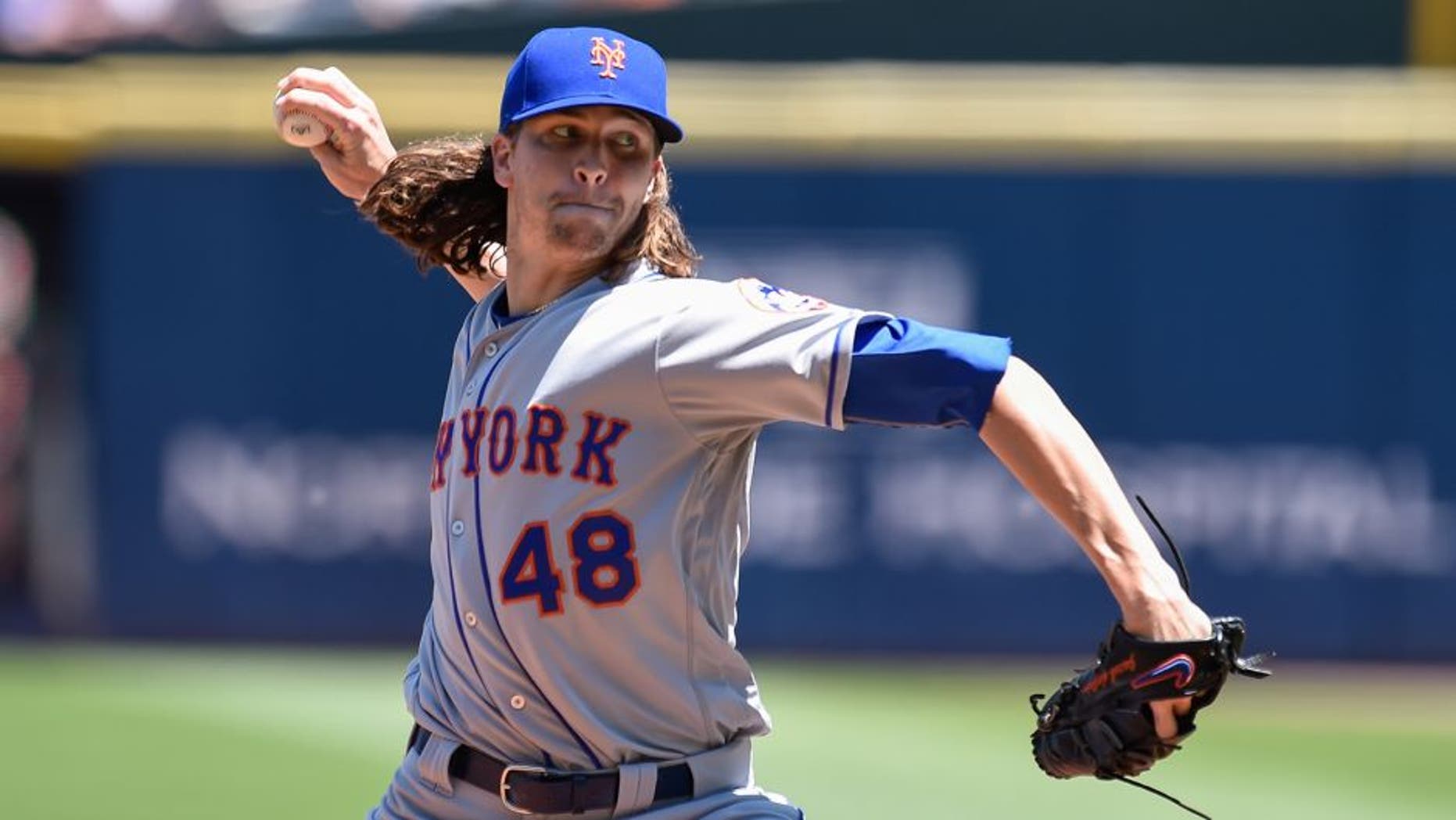 Apr 24, 2016; Atlanta, GA, USA; New York Mets starting pitcher Jacob deGrom (48) pitches against the Atlanta Braves during the first inning at Turner Field. Mandatory Credit: Dale Zanine-USA TODAY Sports