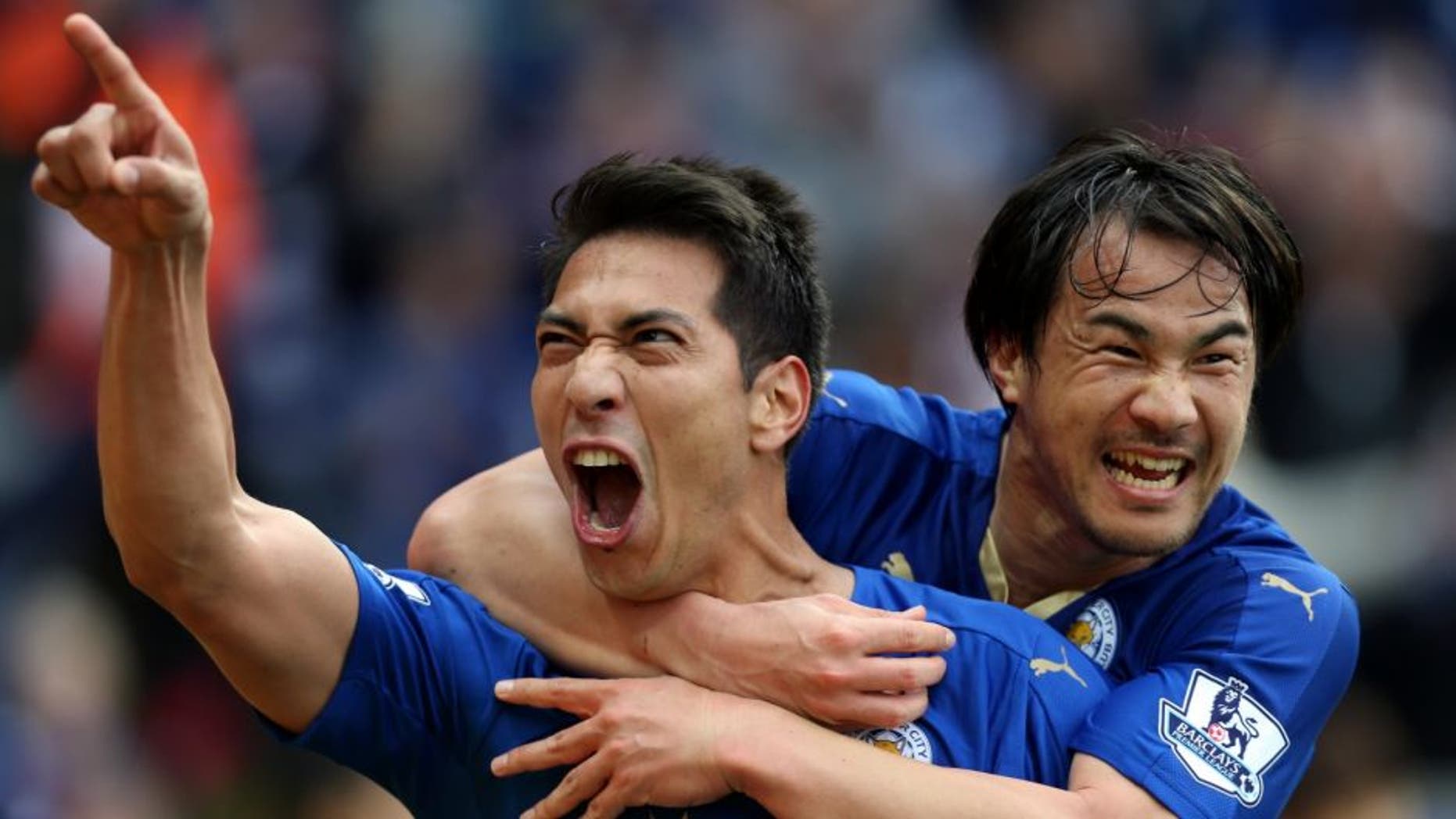 LEICESTER, ENGLAND - APRIL 24 : Leonardo Ulloa of Leicester City celebrates with Shinji Okazaki of Leicester City after scoring to make it 2-0 during the Barclays Premier League match between Leicester City and Swansea City at the King Power Stadium on April 24 , 2016 in Leicester, United Kingdom. (Photo by Plumb Images/Leicester City FC via Getty Images)
