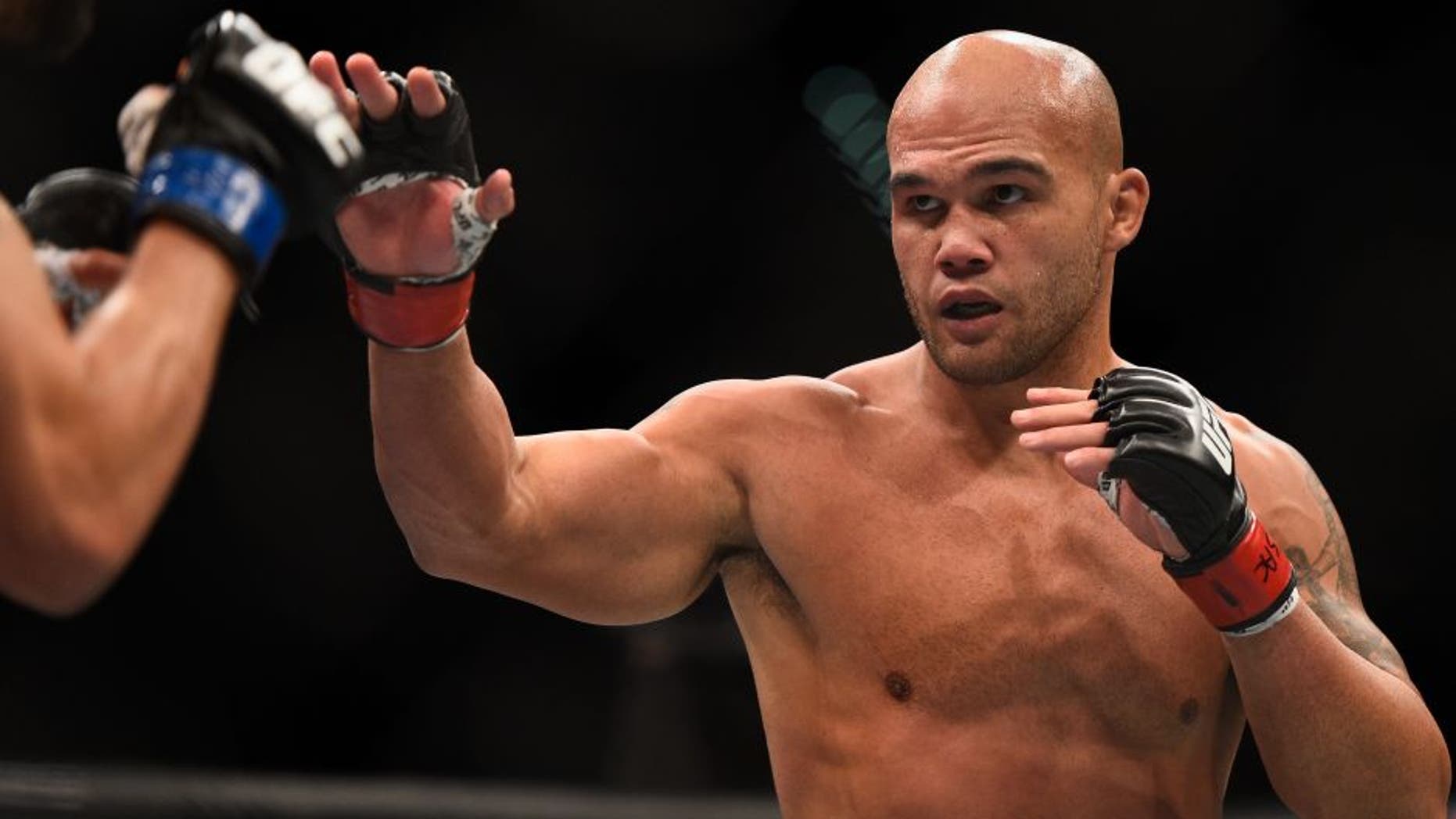 LAS VEGAS, NV - JANUARY 02: (R-L) Robbie Lawler faces off against his opponent in their UFC welterweight championship bout during the UFC 195 event inside MGM Grand Garden Arena on January 2, 2016 in Las Vegas, Nevada. (Photo by Jeff Bottari/Zuffa LLC/Zuffa LLC via Getty Images)
