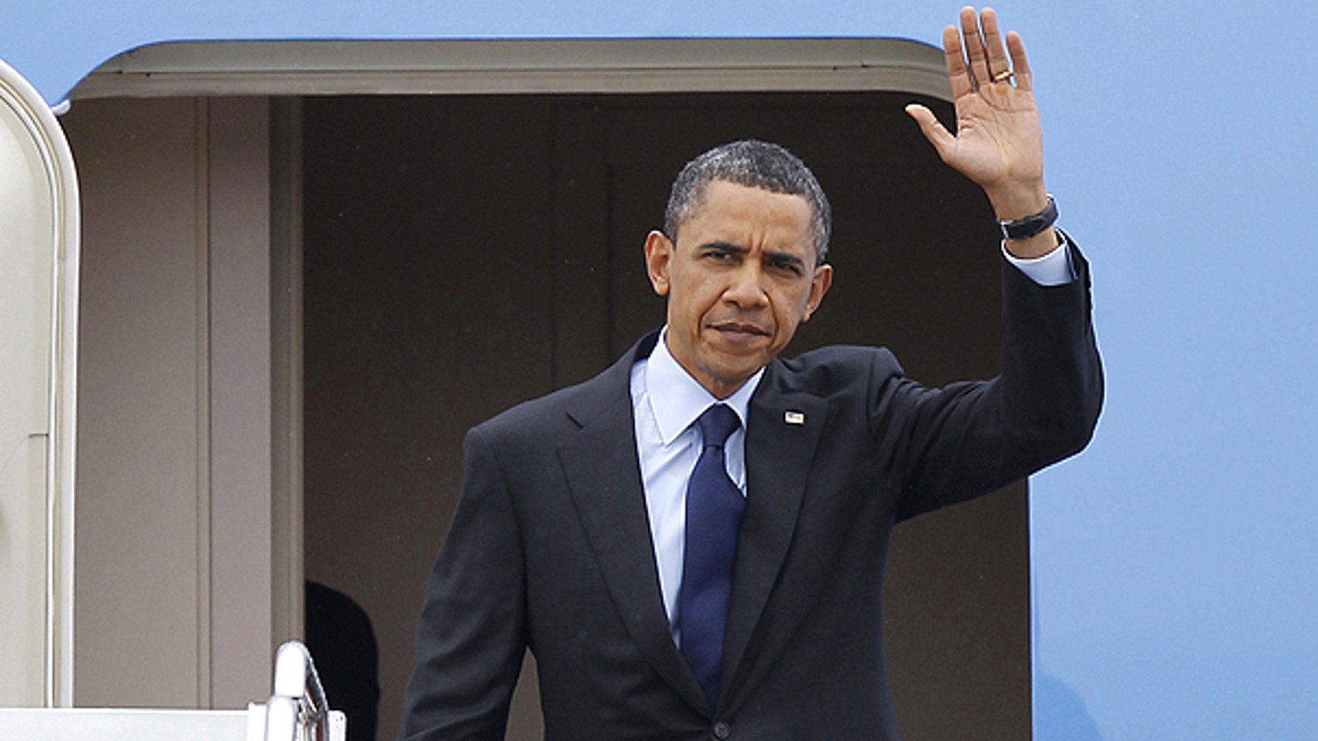 April 22: President Obama waves upon his arrival at Andrews Air Force Base, Md.