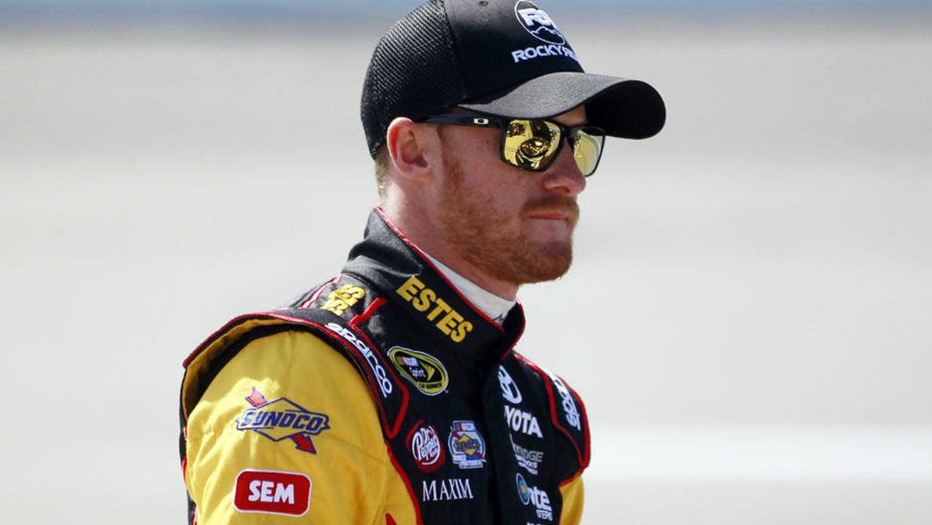 RICHMOND, VA - APRIL 24: Jeb Burton, driver of the #26 Estes Express Lines Toyota, stands on the grid during practice for the NASCAR Sprint Cup Series Toyota Owners 400 at Richmond International Raceway on April 24, 2015 in Richmond, Virginia. (Photo by Brian Lawdermilk/NASCAR via Getty Images)