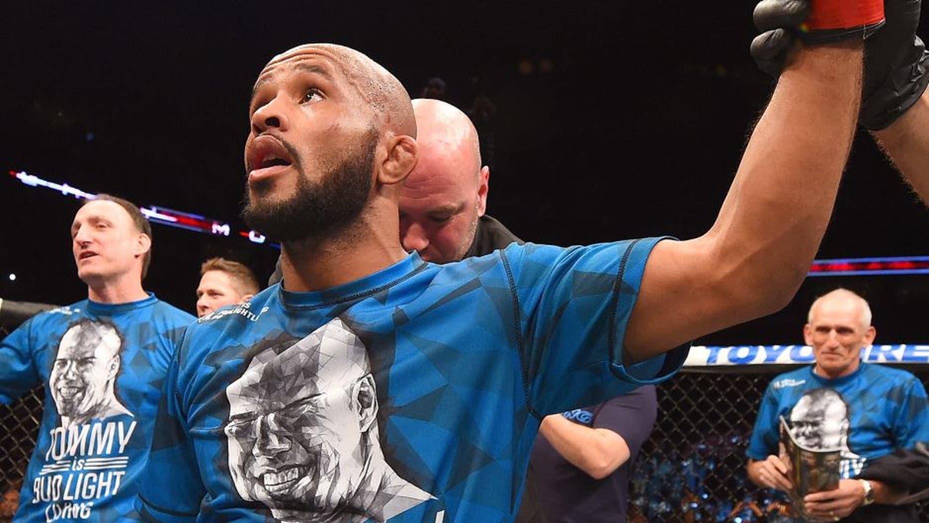 MONTREAL, QC - APRIL 25: Demetrious Johnson of the United States reacts after his submission victory over Kyoji Horiguchi of Japan in their UFC flyweight championship bout during the UFC 186 event at the Bell Centre on April 25, 2015 in Montreal, Quebec, Canada. (Photo by Josh Hedges/Zuffa LLC/Zuffa LLC via Getty Images)