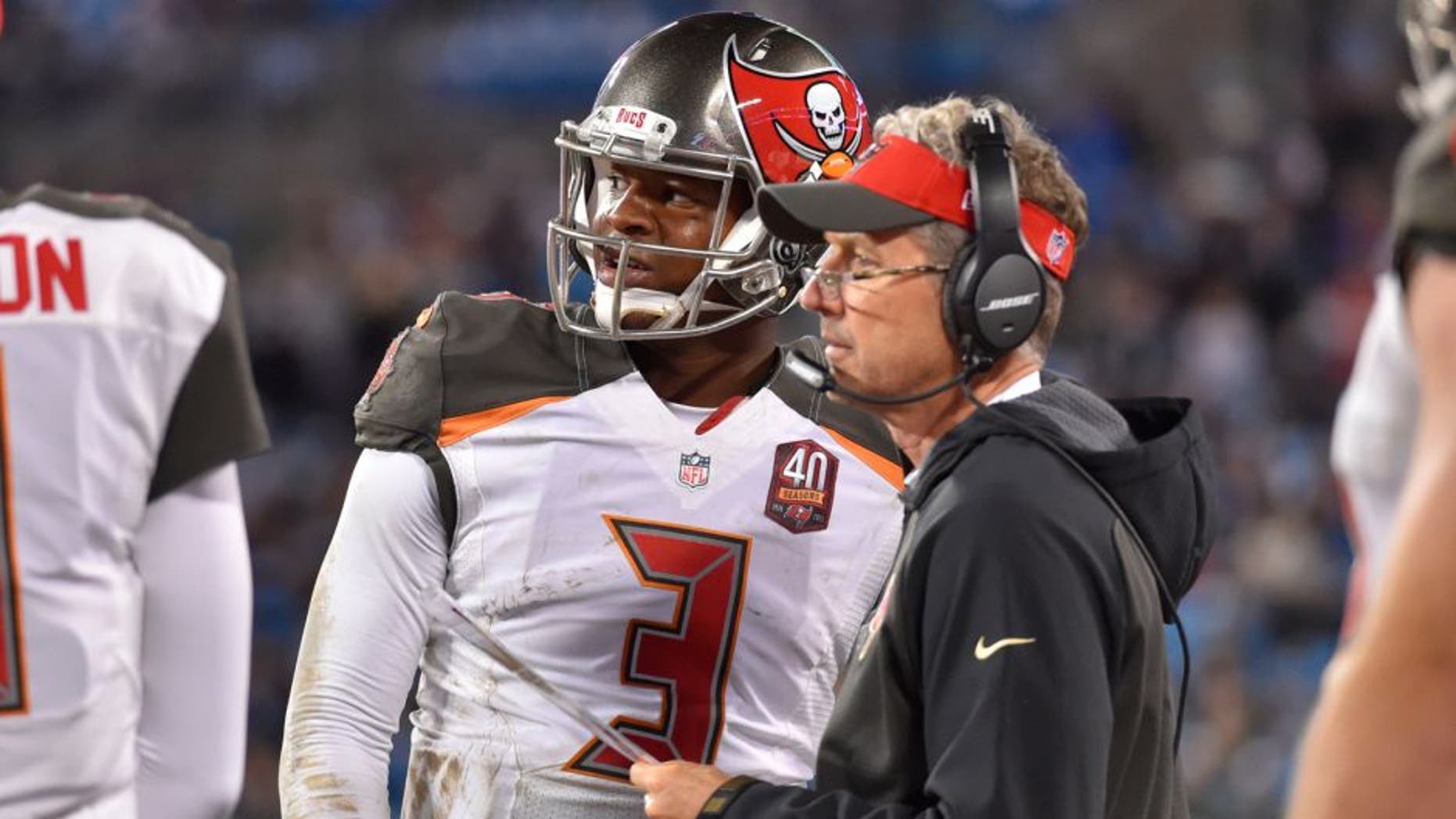 Jan 3, 2016; Charlotte, NC, USA; Tampa Bay Buccaneers quarterback Jameis Winston (3) with offensive coordinator Dirk Koetter in the fourth quarter. The Panthers defeated the Buccaneers 38-10 at Bank of America Stadium. Mandatory Credit: Bob Donnan-USA TODAY Sports