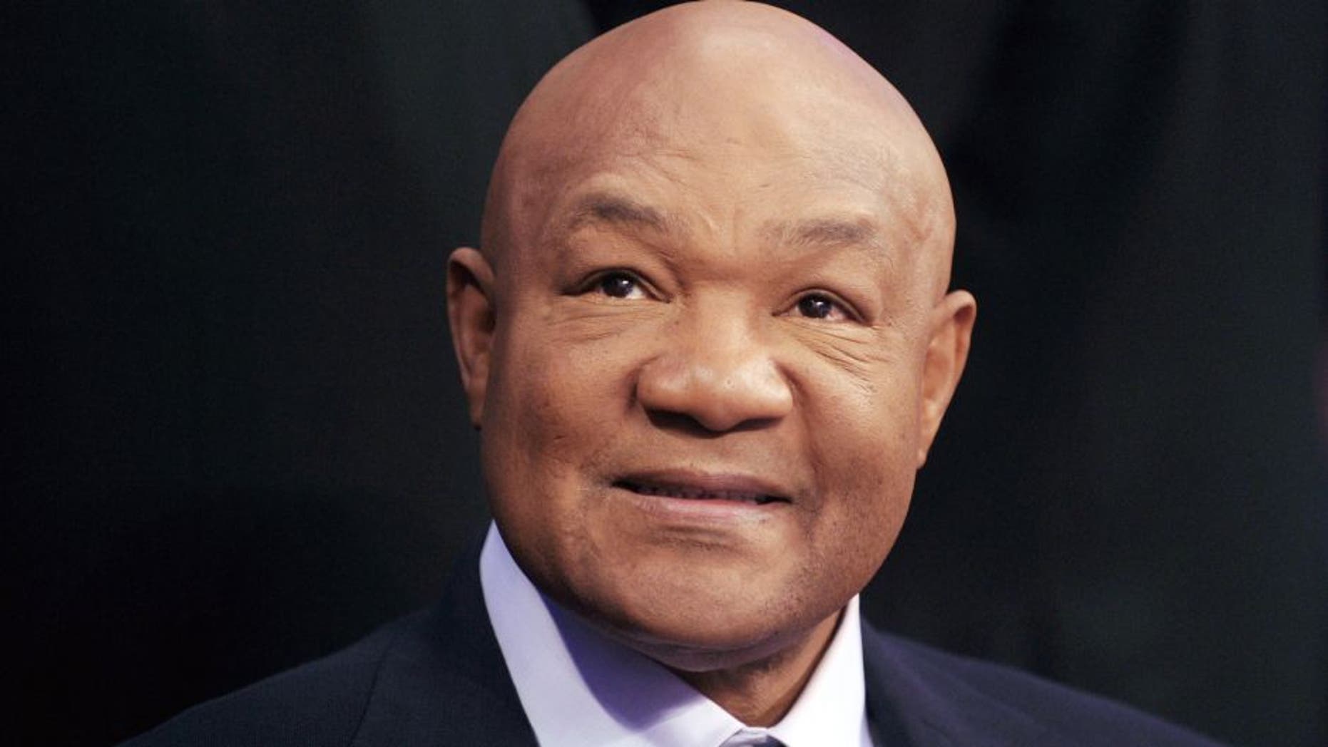 Former two-time world heavyweight champion George Foreman smiles during the 'Fists of Gold' boxing event in Macau on April 6, 2013. AFP PHOTO / Dale de la Rey (Photo credit should read DALE de la REY/AFP/Getty Images)