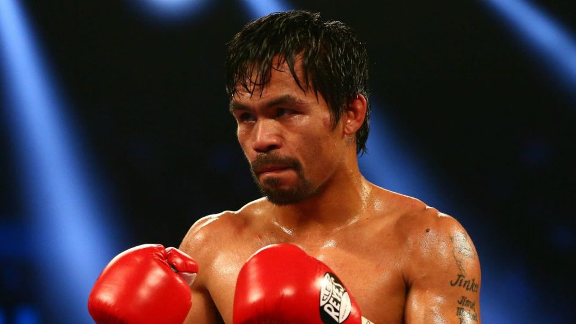 April 9, 2016; Las Vegas, NV, USA; Manny Pacquiao fights against Timothy Bradley at MGM Grand Garden Arena. Mandatory Credit: Mark J. Rebilas-USA TODAY Sports