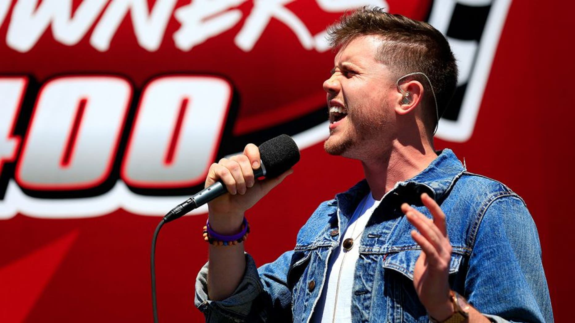 RICHMOND, VA - APRIL 24: Country music singer and American Idol winner Trent Harmon performs the national anthem prior to the NASCAR Sprint Cup Series TOYOTA OWNERS 400 at Richmond International Raceway on April 24, 2016 in Richmond, Virginia. (Photo by Daniel Shirey/NASCAR via Getty Images)