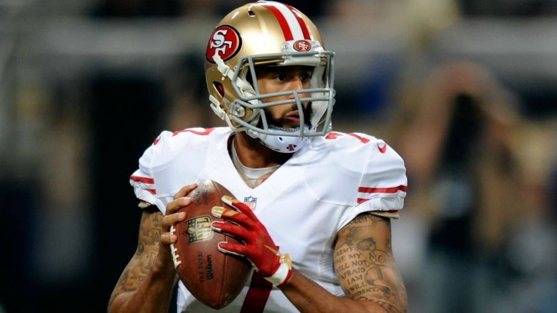 ST. LOUIS, MO - NOVEMBER 1: Colin Kaepernick #7 of the San Francisco 49ers looks to pass against the St. Louis Rams in the first quarter at the Edward Jones Dome on November 1, 2015 in St. Louis, Missouri. (Photo by Michael B. Thomas/Getty Images)