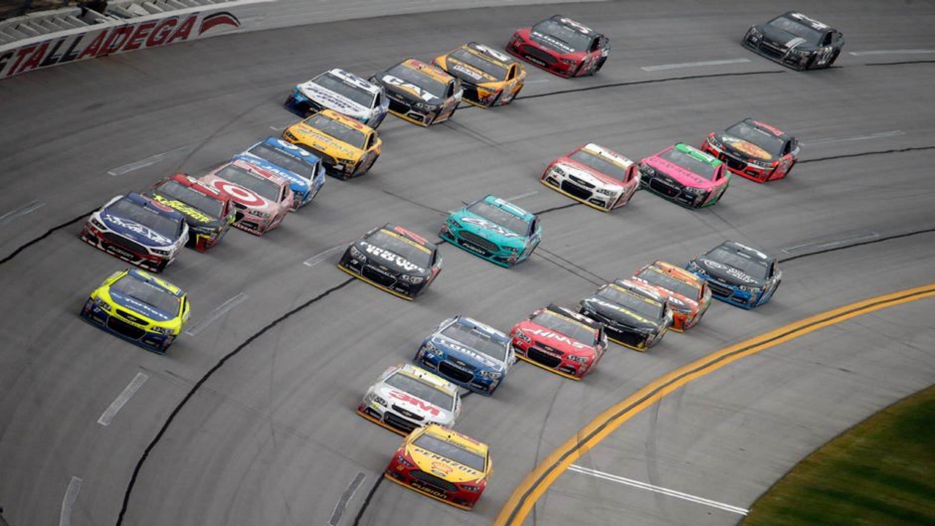 TALLADEGA, AL - OCTOBER 25: Joey Logano, driver of the #22 Shell Pennzoil Ford, leads the field during the NASCAR Sprint Cup Series CampingWorld.com 500 at Talladega Superspeedway on October 25, 2015 in Talladega, Alabama. (Photo by Brian Lawdermilk/Getty Images)