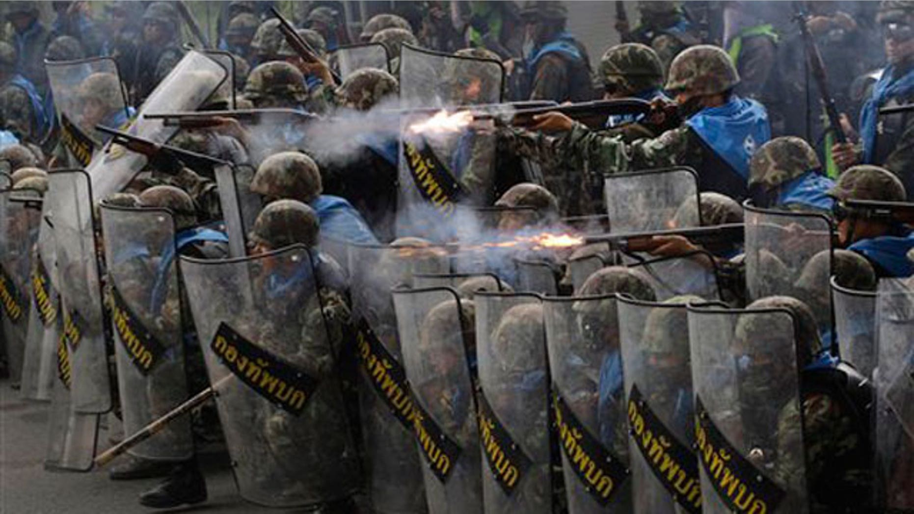 April 28: Thai soldiers fire on anti-government protesters during clashes near Bangkok.