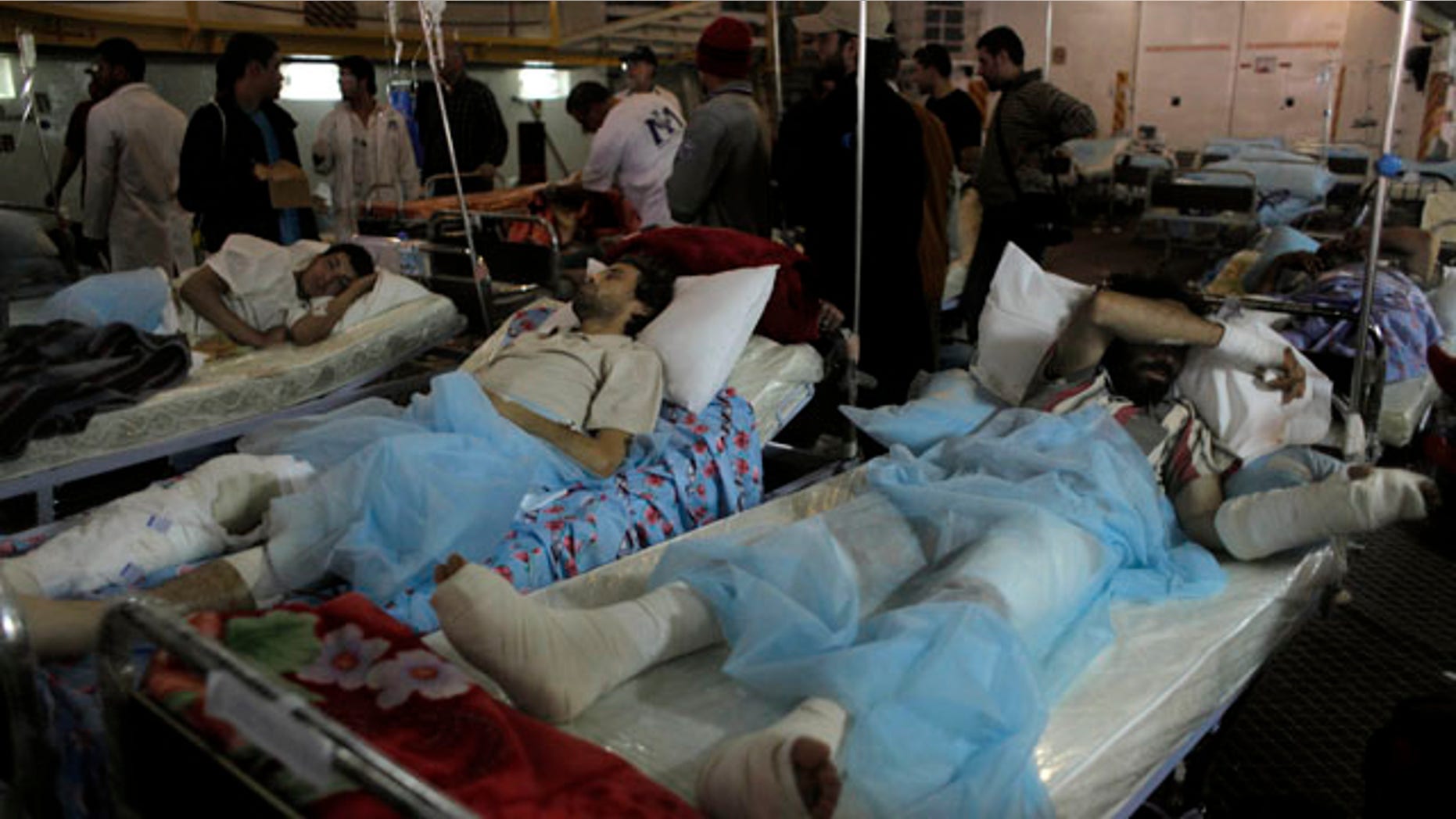 April 28: Injured Libyans wait to be evacuated into ambulances, on board the Albanian ferry Red Star 1 that evacuated injuries and refugees fleeing the battered city of Misrata, Libya.