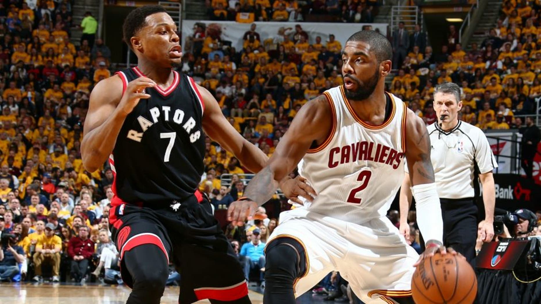 CLEVELAND, OH - MAY 17: Kyrie Irving #2 of the Cleveland Cavaliers handles the ball against the Toronto Raptors in Game One of the Eastern Conference Finals during the 2016 NBA Playoffs on May 17, 2016 at Quicken Loans Arena in Cleveland, Ohio. NOTE TO USER: User expressly acknowledges and agrees that, by downloading and or using this Photograph, user is consenting to the terms and conditions of the Getty Images License Agreement. Mandatory Copyright Notice: Copyright 2016 NBAE (Photo by Nathaniel S. Butler/NBAE via Getty Images)