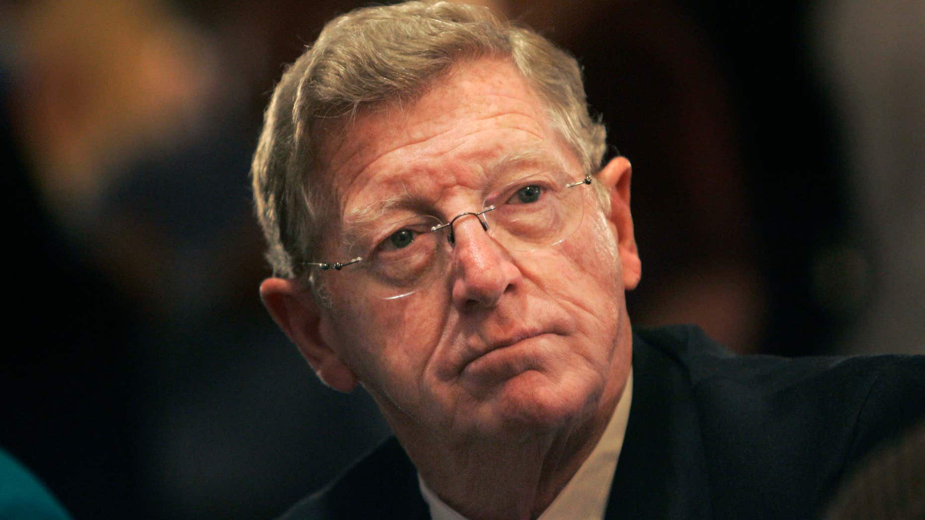 FILE - In this Nov. 7, 2006 file photo, Sen. Conrad Burns, R-Mont., watches returns at a victory party in Billings, Mont.