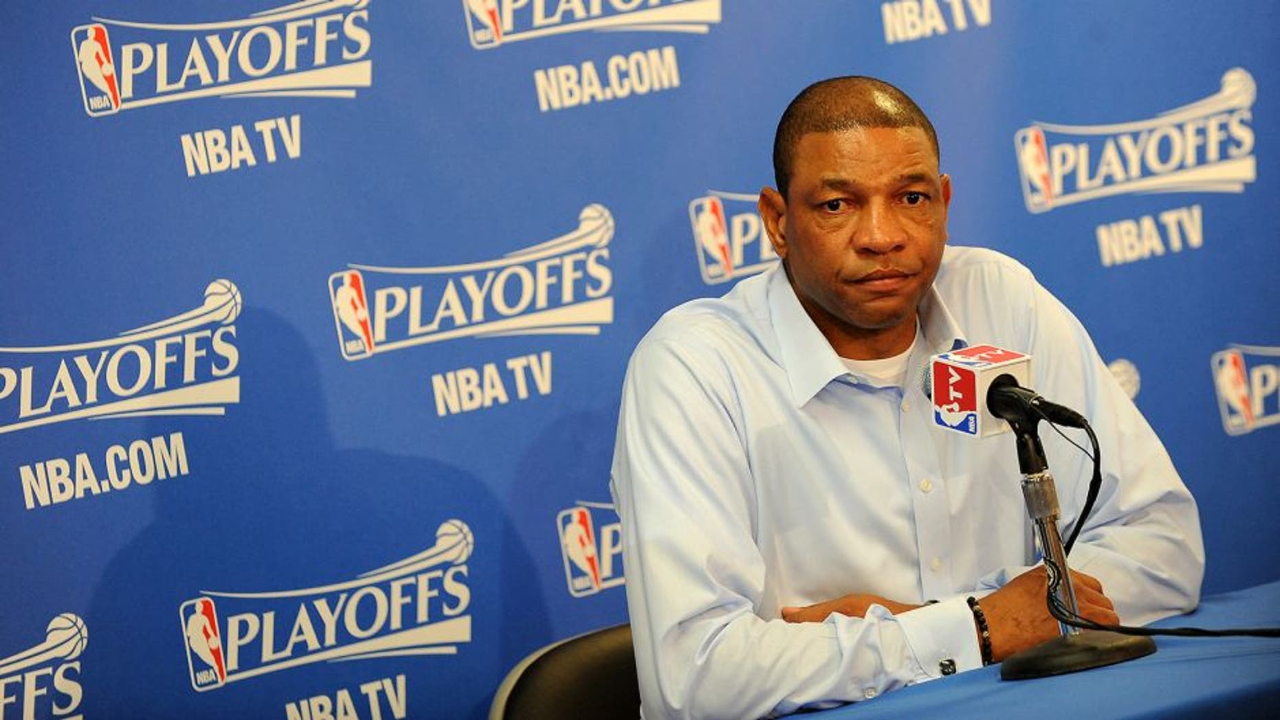 OAKLAND, CA - APRIL 27: Head Coach Doc Rivers of the Los Angeles Clippers talks to the media prior to the game against the Golden State Warriors in Game Four of the Western Conference Quarterfinals at Oracle Arena on April 27, 2014 in Oakland, California. NOTE TO USER: User expressly acknowledges and agrees that, by downloading and/or using this Photograph, user is consenting to the terms and conditions of the Getty Images License Agreement. Mandatory Copyright Notice: Copyright 2014 NBAE (Photo by Noah Graham/NBAE via Getty Images)