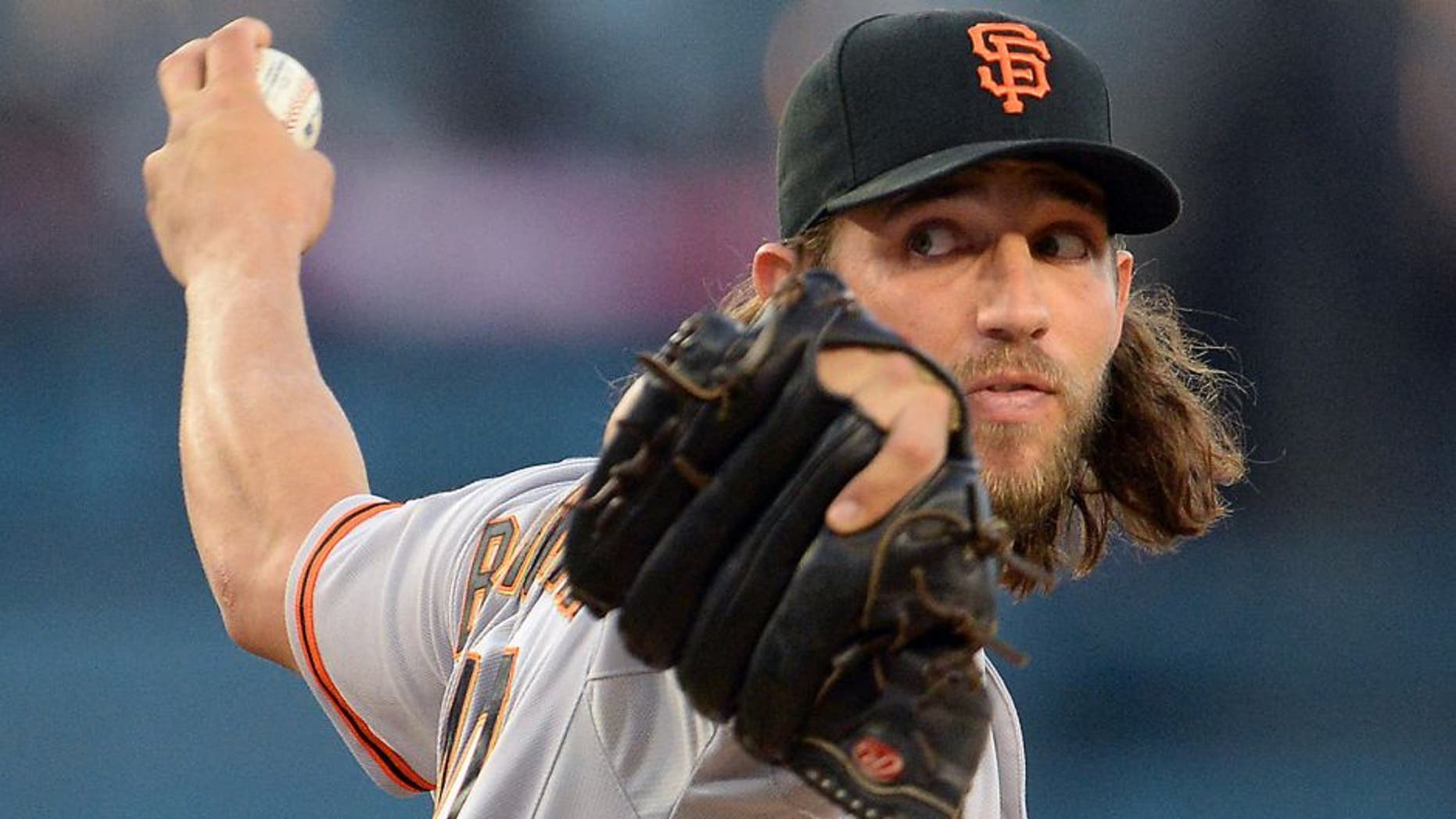 Apr 28, 2015; Los Angeles, CA, USA; San Francisco Giants starting pitcher Madison Bumgarner (40) throws in the first inning against the Los Angeles Dodgers at Dodger Stadium. Mandatory Credit: Jayne Kamin-Oncea-USA TODAY Sports