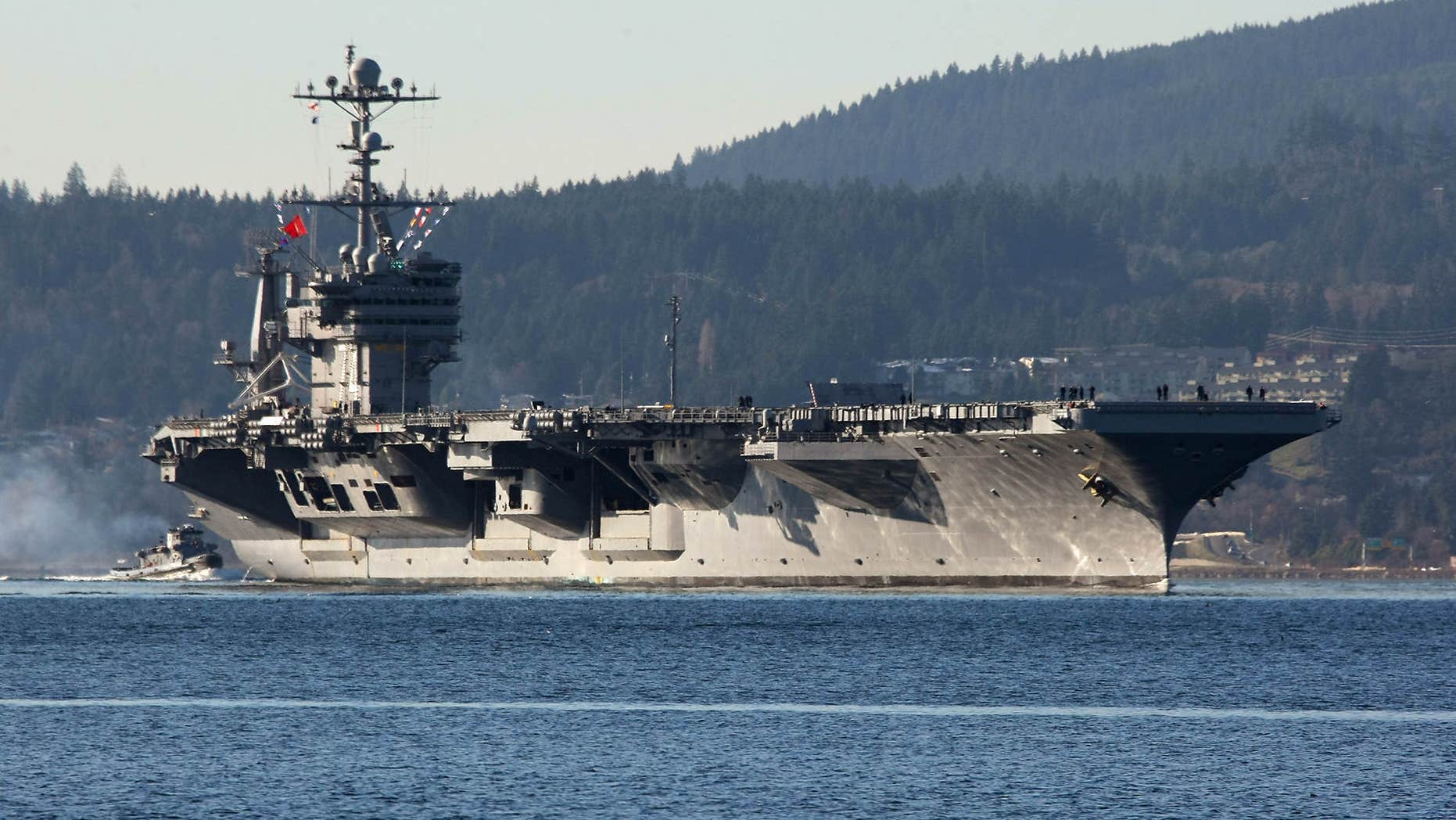 Dec. 1, 2014: FILE - In this photo Dec. 1, 2014 file photo, the aircraft carrier USS John Stennis seen near Bremerton, Wash.