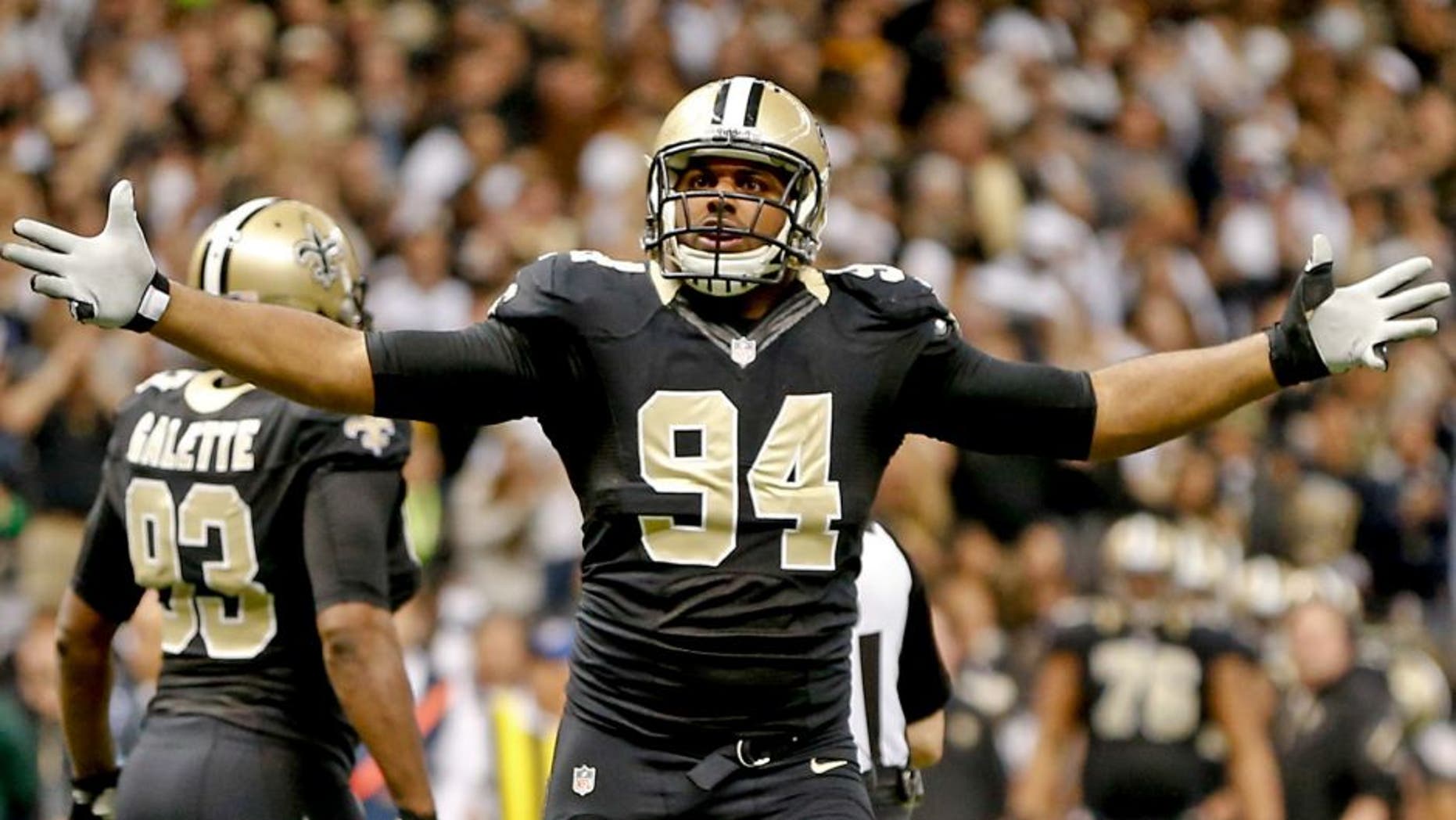 Dec 8, 2013; New Orleans, LA, USA; New Orleans Saints defensive end Cameron Jordan (94) reacts during the second half of a game at Mercedes-Benz Superdome. The Saints defeated the Panthers 31-13. Mandatory Credit: Derick E. Hingle-USA TODAY Sports