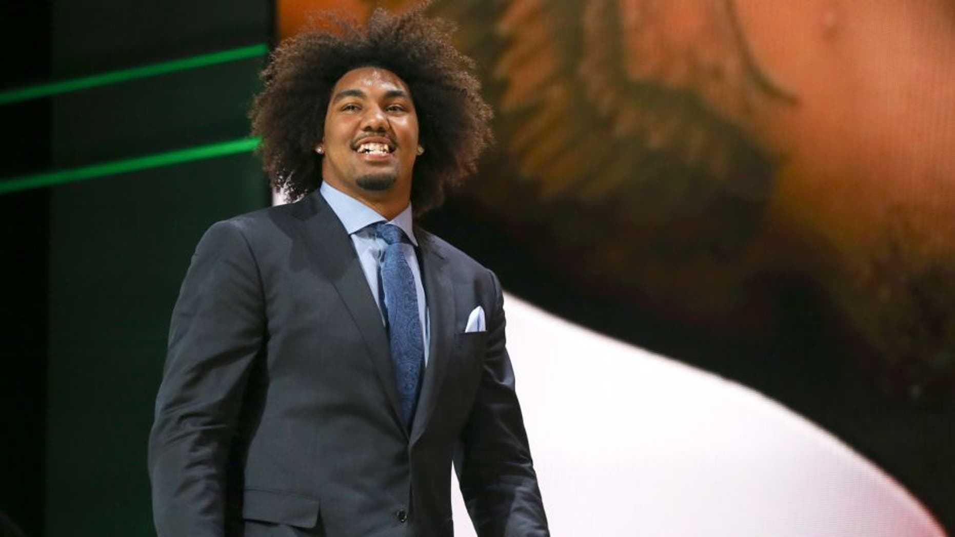 CHICAGO, IL - APRIL 30: Leonard Williams of the USC Trojans walks on stage after being chosen #6 overall by the New York Jets during the first round of the 2015 NFL Draft at the Auditorium Theatre of Roosevelt University on April 30, 2015 in Chicago, Illinois. (Photo by Jonathan Daniel/Getty Images)