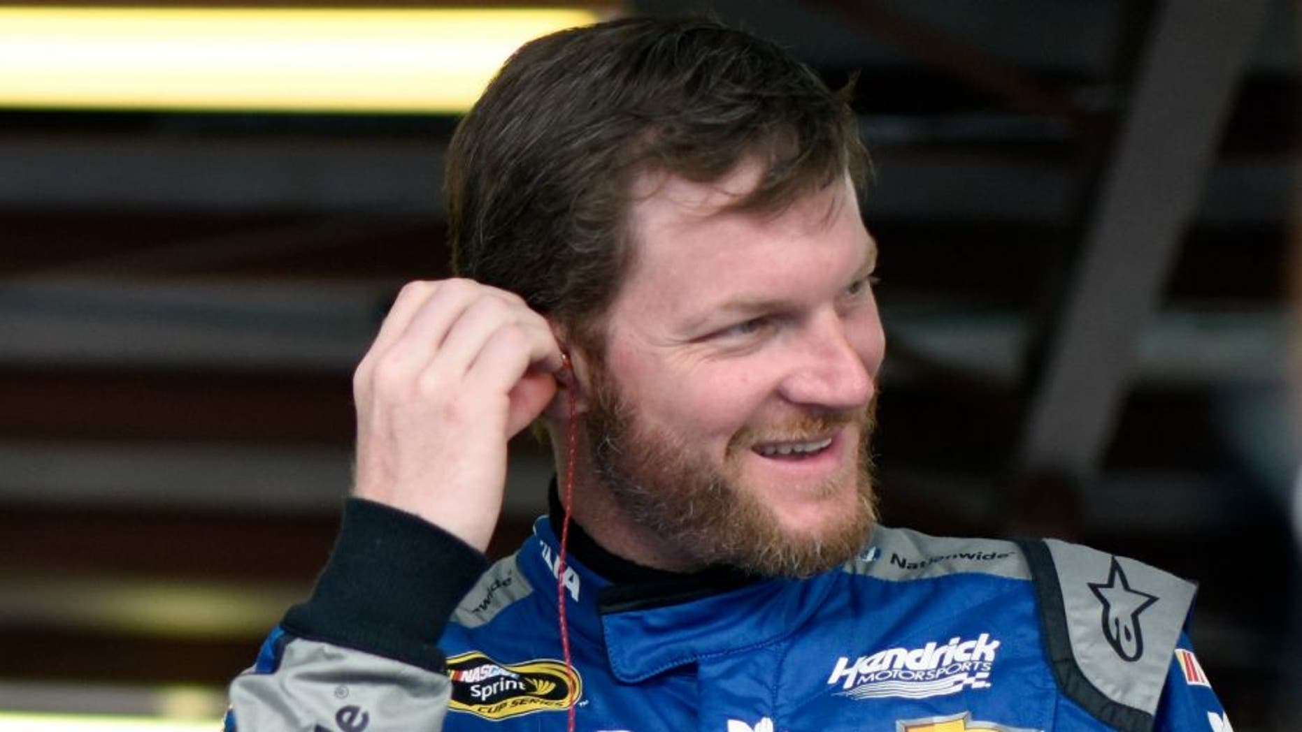 during practice for the NASCAR Sprint Cup Series GEICO 500 at Talladega Superspeedway on April 29, 2016 in Talladega, Alabama.,TALLADEGA, AL - APRIL 29: Dale Earnhardt Jr, driver of the #88 Nationwide Chevrolet, stands in the garage area during practice for the NASCAR Sprint Cup Series GEICO 500 at Talladega Superspeedway on April 29, 2016 in Talladega, Alabama. (Photo by Jared C. Tilton/Getty Images)