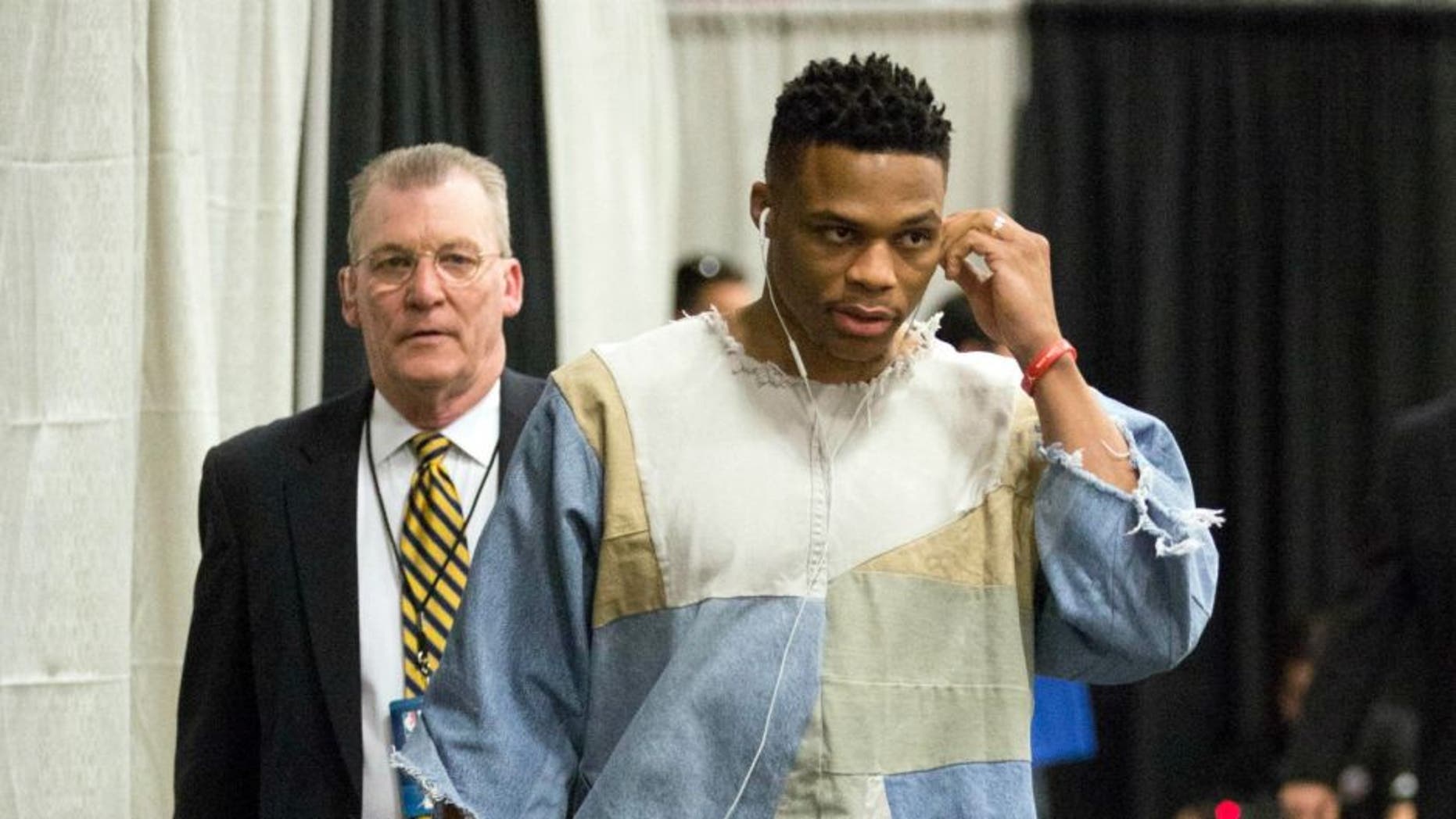 Apr 30, 2016; San Antonio, TX, USA; Oklahoma City Thunder point guard Russell Westbrook (0) arrives to to the arena before game one of the second round of the NBA Playoffs against the San Antonio Spurs at AT&T Center. Mandatory Credit: Soobum Im-USA TODAY Sports