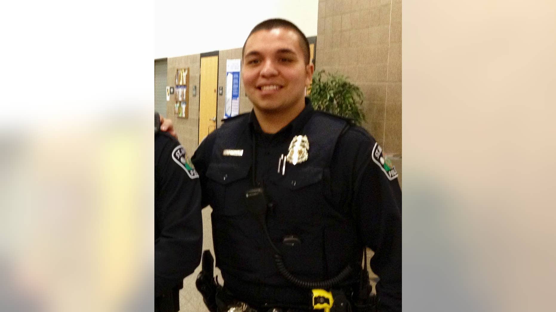 FILE - This Jan. 8, 2013, file photo, provided by Christian Dobratz shows St. Anthony policer Officer Jeronimo Yanez outside the city council chambers in St. Anthony, Minn. The Minnesota Bureau of Criminal Apprehension has been investigating the shooting by Yanez. The agency said Wednesday, Sept. 28, 2016, that it turned over its findings to prosecutors. (Christian Dobratz via AP, File)