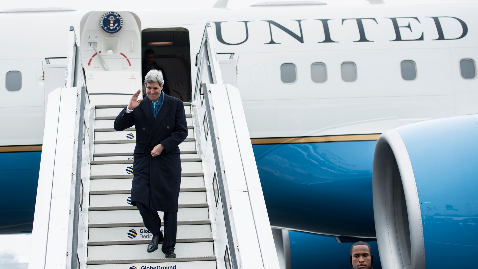 United States' Secretary Of State John Kerry arrives at the Tegel airport in Berlin, Germany, Friday, Jan. 31, 2014. Kerry will meet with Foreign Minister Frank-Walter Steinmeier and Chancellor Angela Merkel prior to his trip to Munich for the Security Conference. (AP Photo/Brendan Smialowski, Pool)