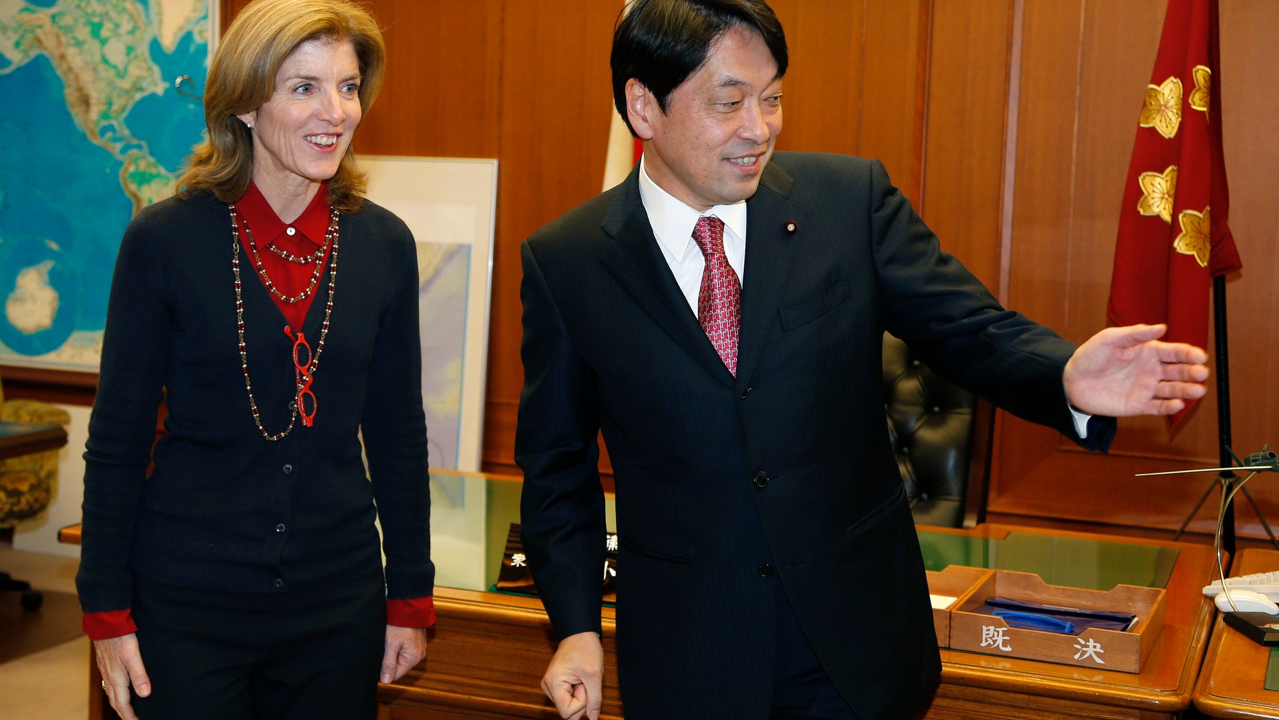 New U.S. Ambassador to Japan Caroline Kennedy is greeted by Japanese Defense Minister Itsunori Onodera at the start of their meeting at Japan's Defense Ministry in Tokyo, Thursday, Nov. 21, 2013. (AP Photo/Shizuo Kambayashi)