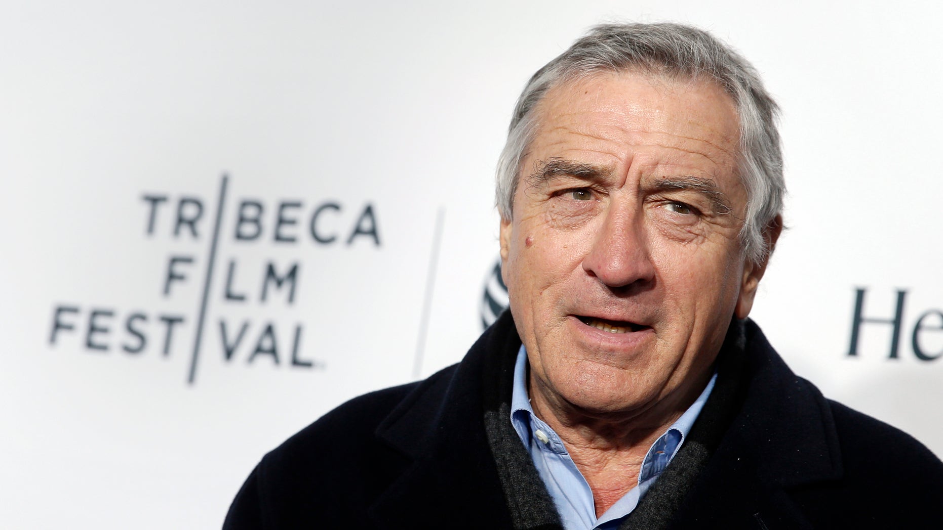 April 16, 2014. Robert De Niro poses on the red carpet upon arriving for the 2014 Tribeca Film Festival opening night in New York.