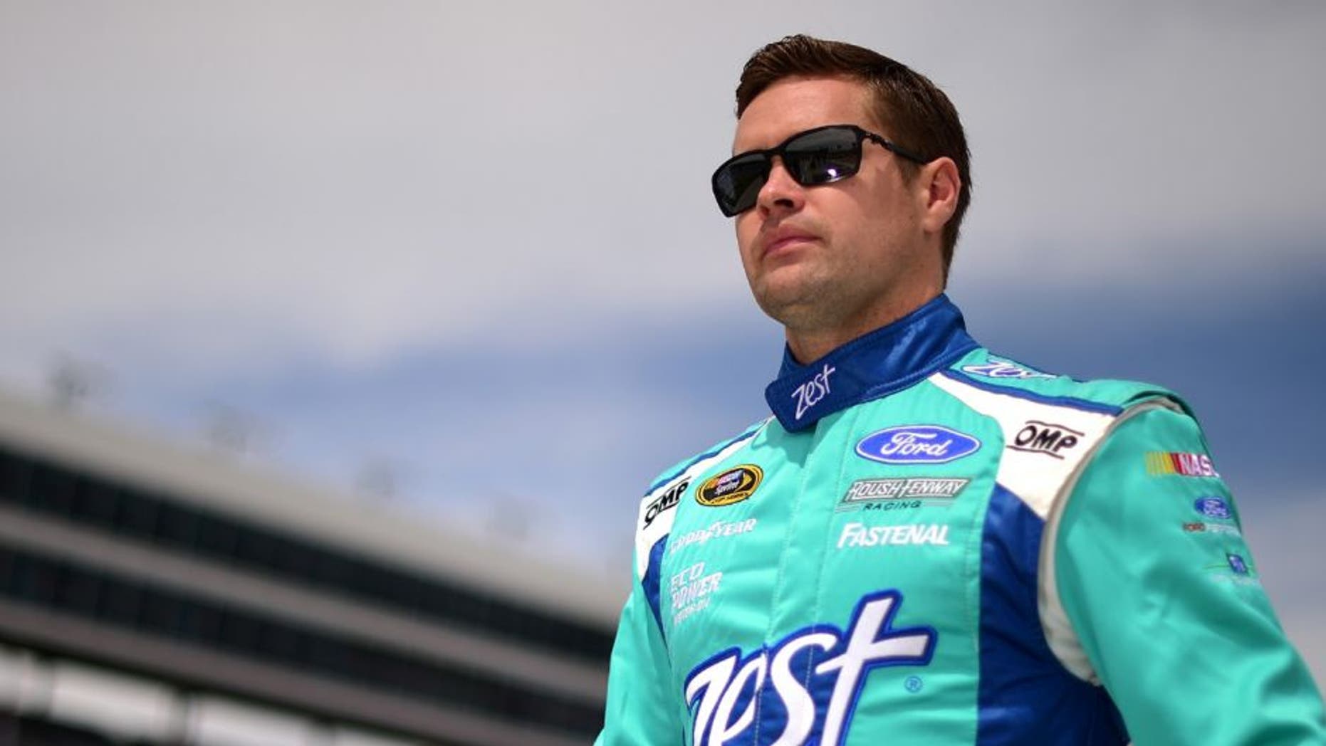 FORT WORTH, TEXAS - APRIL 08: Ricky Stenhouse Jr., driver of the #17 Zest Ford, walks on the grid during qualifying for the NASCAR Sprint Cup Series Duck Commander 500 at Texas Motor Speedway on April 8, 2016 in Fort Worth, Texas. (Photo by Jared C. Tilton/NASCAR via Getty Images)