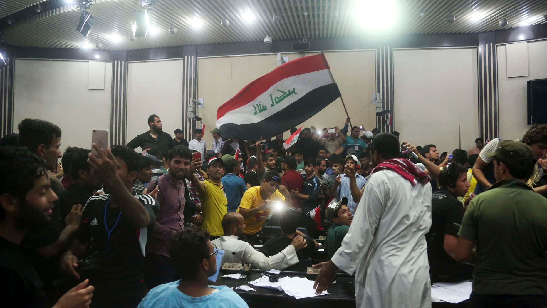April 30, 2016: Supporters of Shiite cleric Muqtada al-Sadr storm parliament in Baghdad's Green Zone.