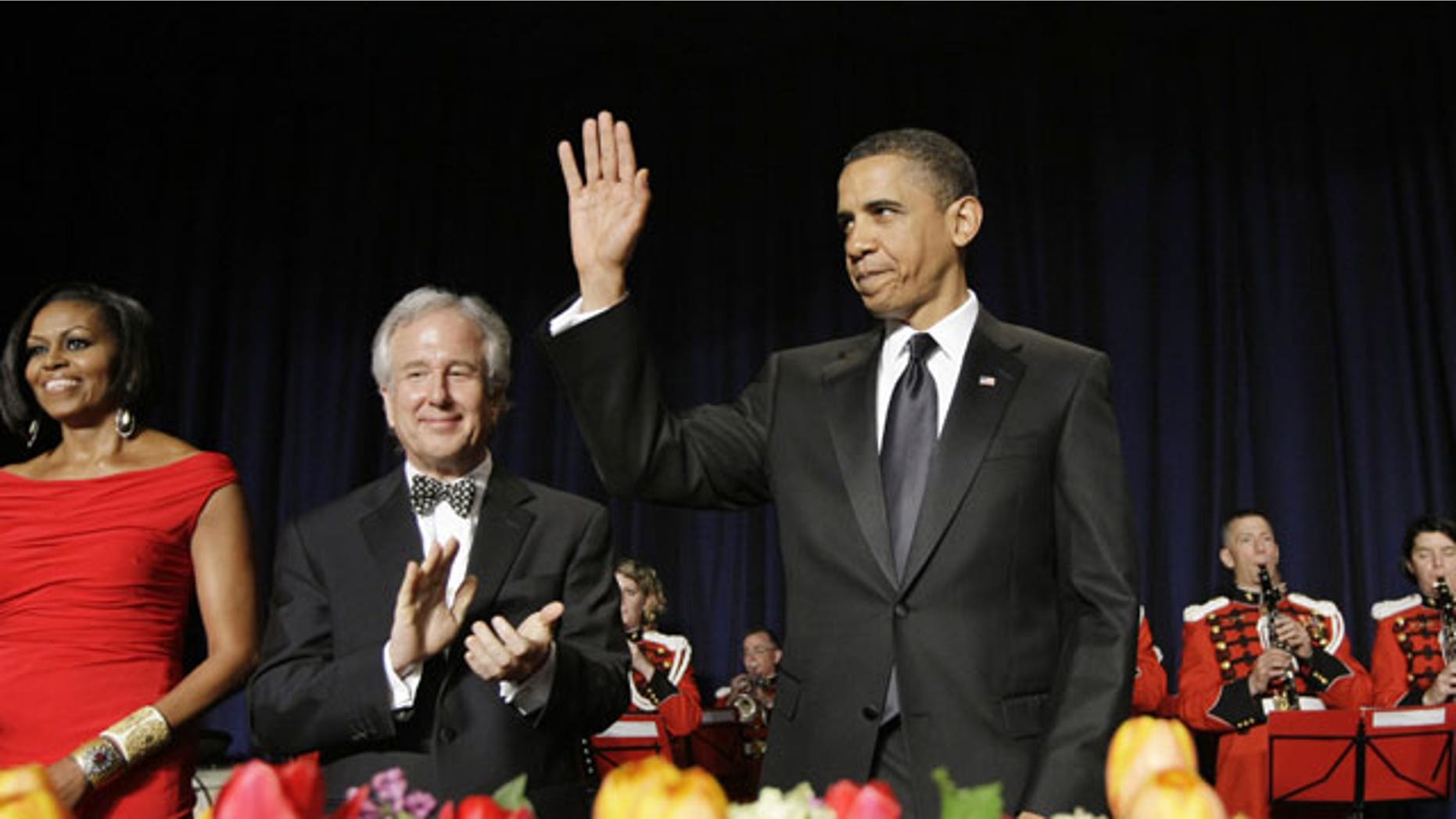 May 1: President Obama and first lady Michelle Obama are welcomed by the White House Correspondents' Association as they arrive for the annual fundraising dinner, at the Washington Hilton Hotel.