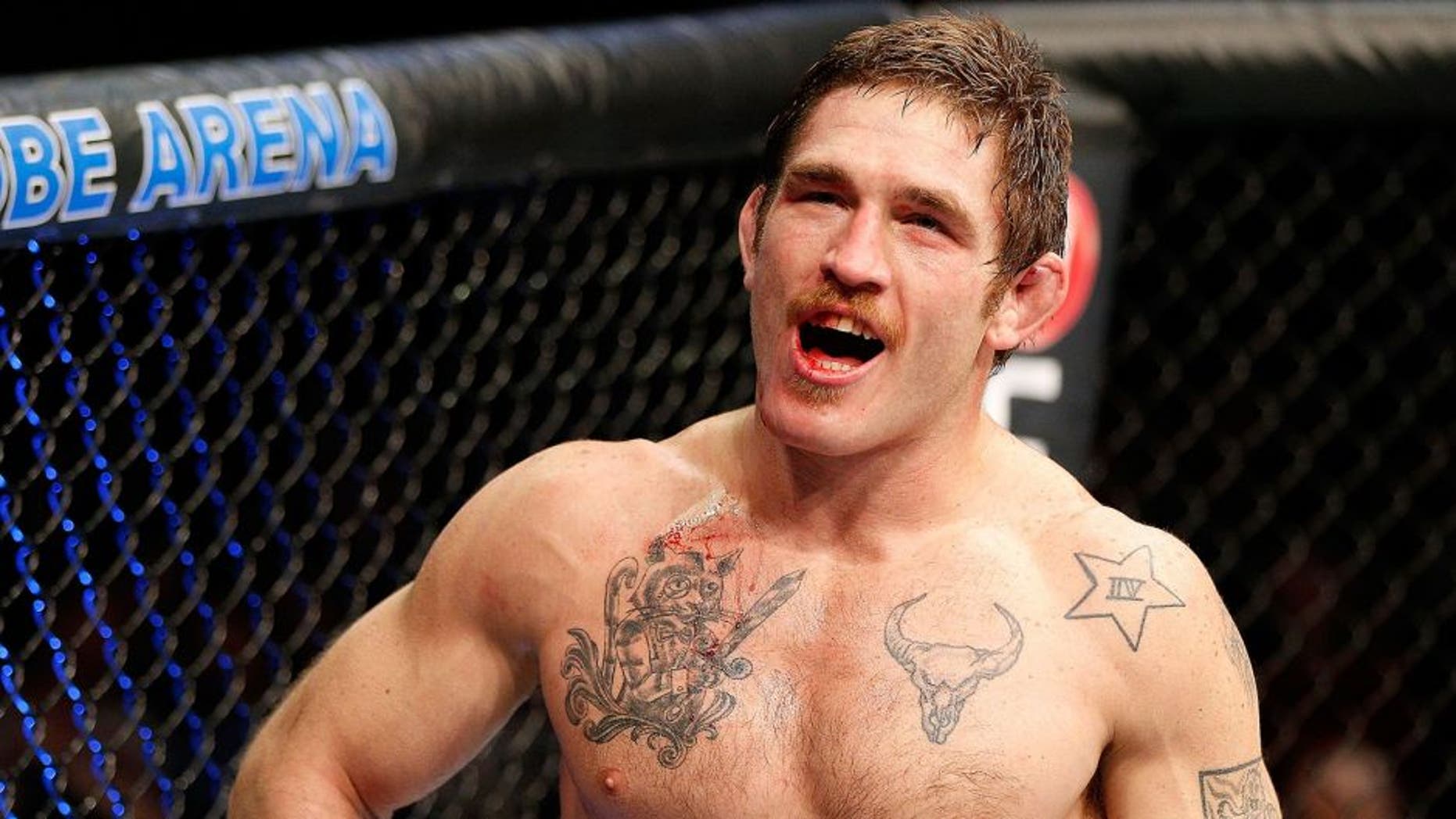 STOCKHOLM, SWEDEN - APRIL 06: Tom Lawlor reacts after defeating Michael Kuiper in their middleweight fight at the Ericsson Globe Arena on April 6, 2013 in Stockholm, Sweden. (Photo by Josh Hedges/Zuffa LLC/Zuffa LLC via Getty Images)