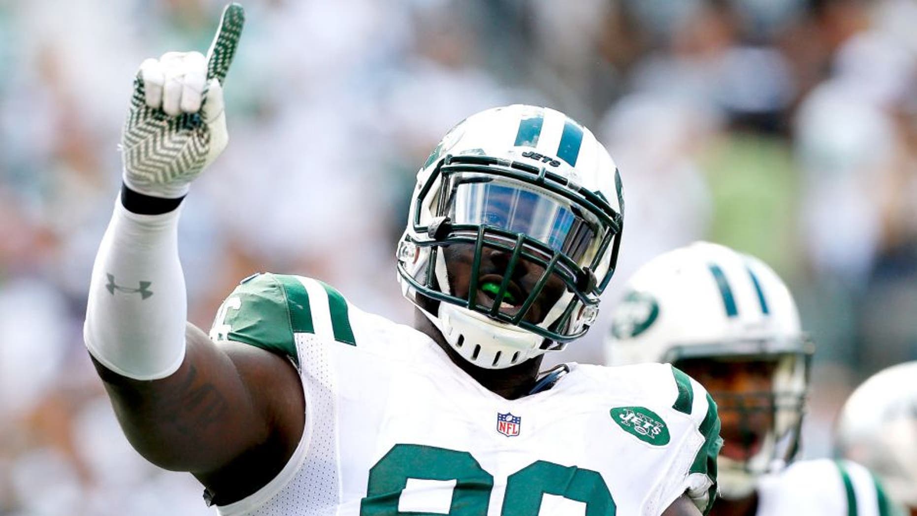 EAST RUTHERFORD, NJ - SEPTEMBER 07: (NEW YORK DAILIES OUT) Muhammad Wilkerson #96 of the New York Jets in action against the Oakland Raiders on September 7, 2014 at MetLife Stadium in East Rutherford, New Jersey. The Jets defeated the Raiders 19-14. (Photo by Jim McIsaac/Getty Images) *** Local Caption *** Muhammad Wilkerson