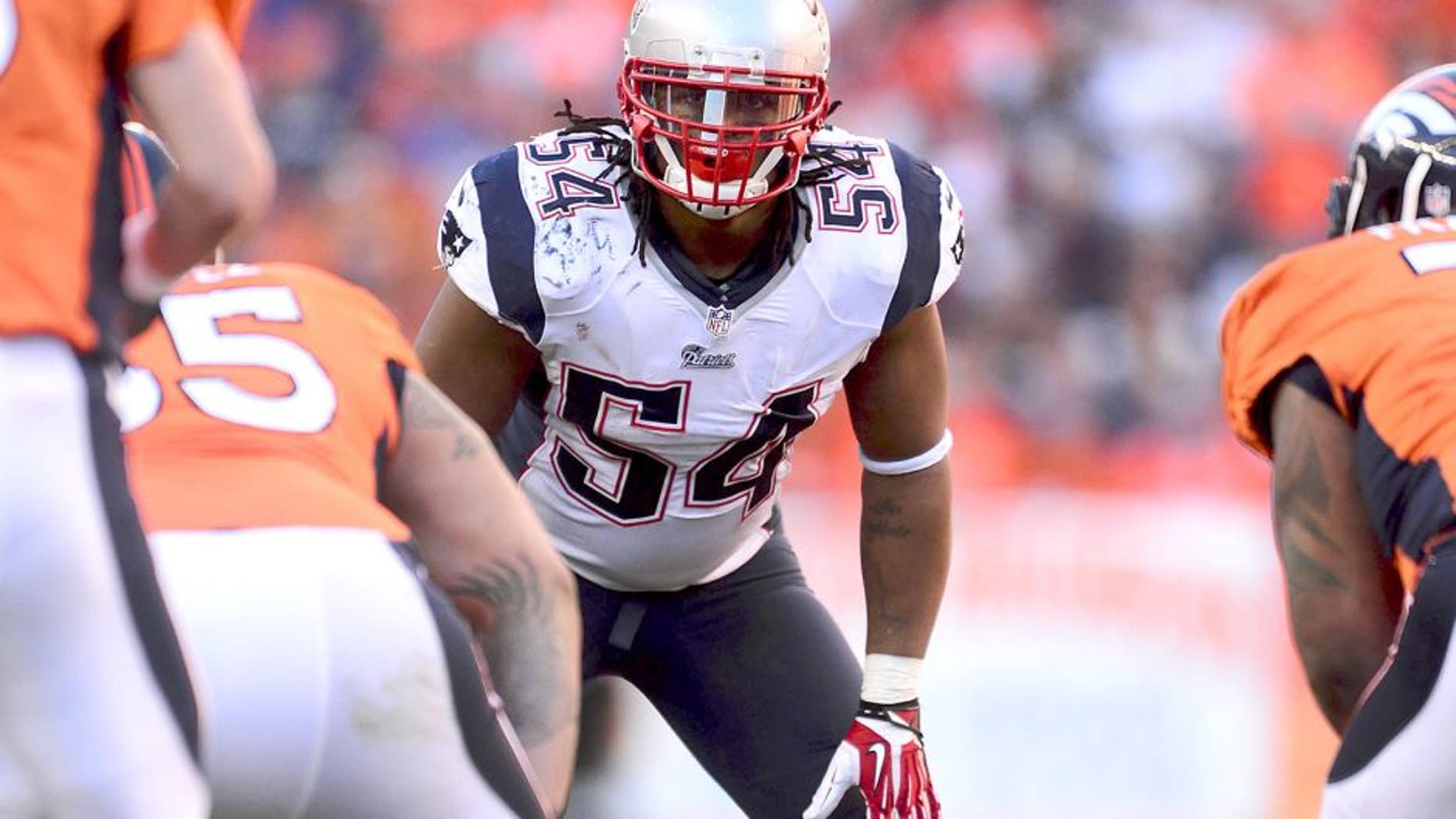 January 19, 2014; Denver, CO, USA; New England Patriots outside linebacker Dont'a Hightower (54) in the first of the game against the Denver Broncos of the 2013 AFC Championship football game at Sports Authority Field at Mile High. Mandatory Credit: Ron Chenoy-USA TODAY Sports