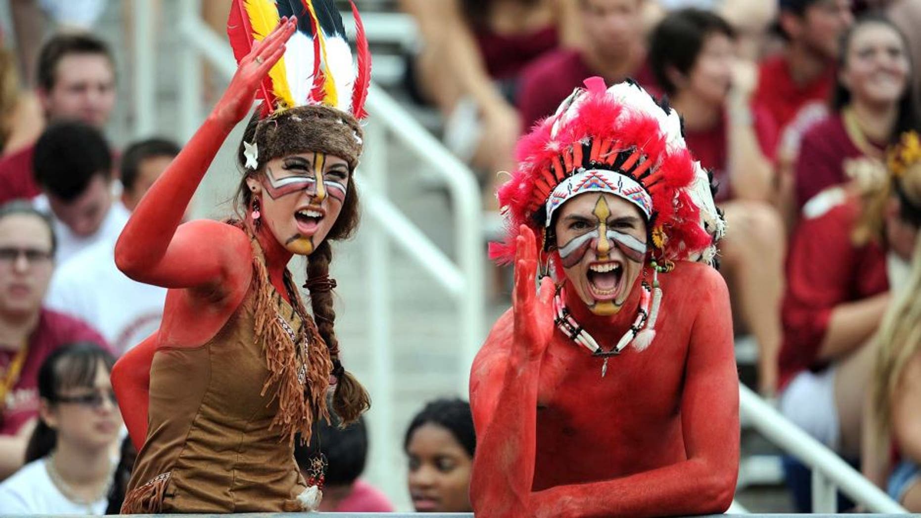 Sept 8, 2012; Tallahassee, Florida, USA; Florida State Seminoles fans cheer during the game against the Savannah State Tigers at Doak Campbell Stadium. Mandatory Credit: Melina Vastola-USA TODAY Sports
