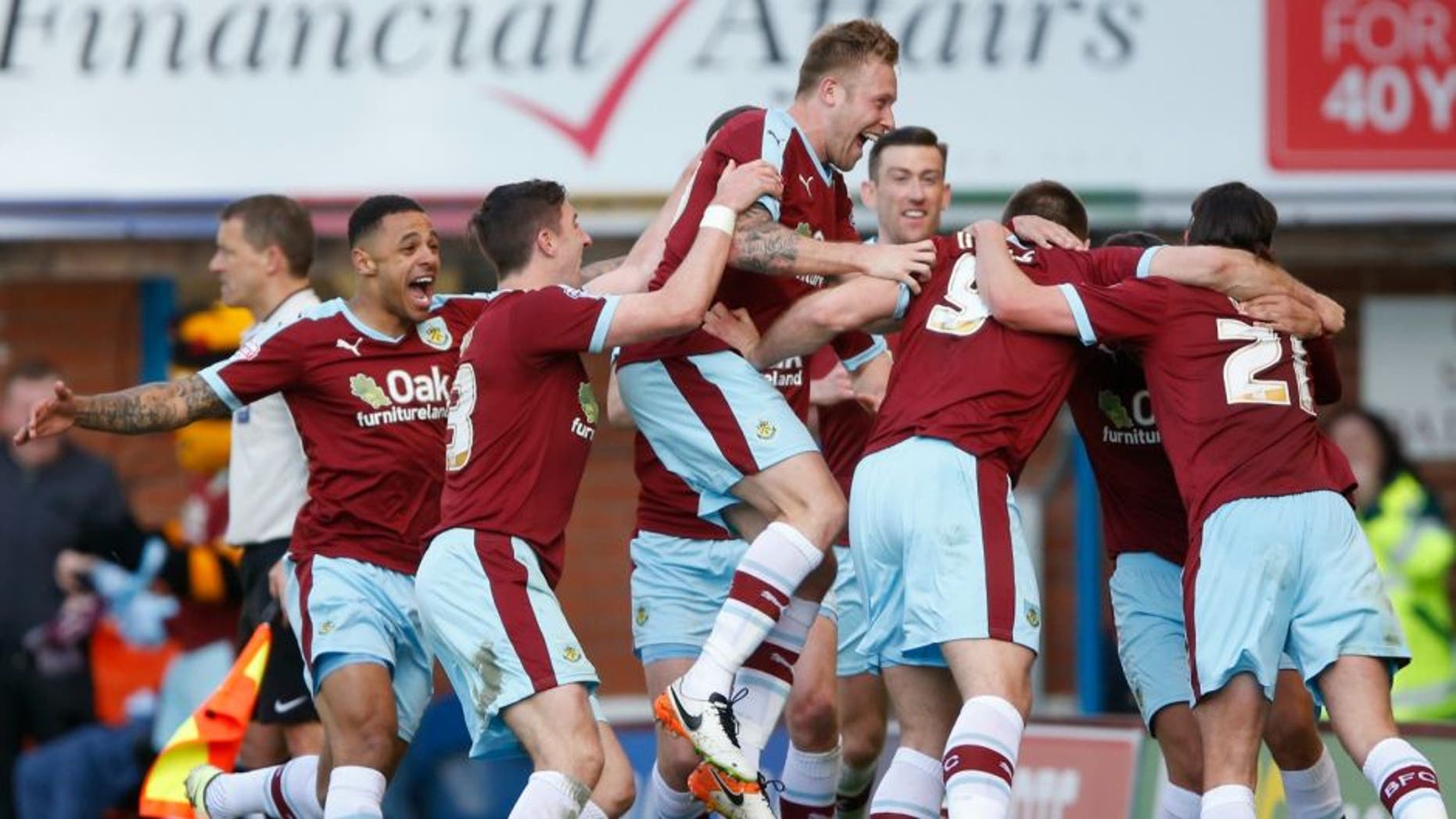 Britain Football Soccer - Burnley v Queens Park Rangers - Sky Bet Football League Championship - Turf Moor - 2/5/16 Burnley's Sam Vokes celebrates scoring their first goal with teammates Mandatory Credit: Action Images / Carl Recine Livepic EDITORIAL USE ONLY. No use with unauthorized audio, video, data, fixture lists, club/league logos or "live" services. Online in-match use limited to 45 images, no video emulation. No use in betting, games or single club/league/player publications. Please contact your account representative for further details.