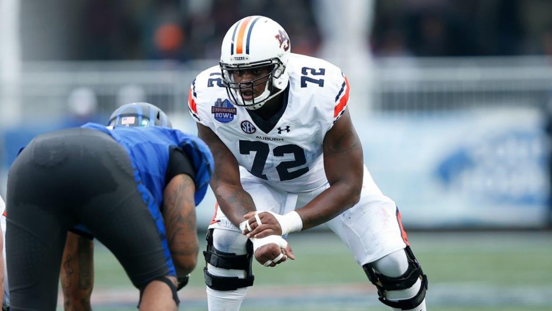 BIRMINGHAM, AL - DECEMBER 30: Shon Coleman #72 of the Auburn Tigers in action against the Memphis Tigers during the Birmingham Bowl at Legion Field on December 30, 2015 in Birmingham, Alabama. Auburn defeated Memphis 31-10. (Photo by Joe Robbins/Getty Images)