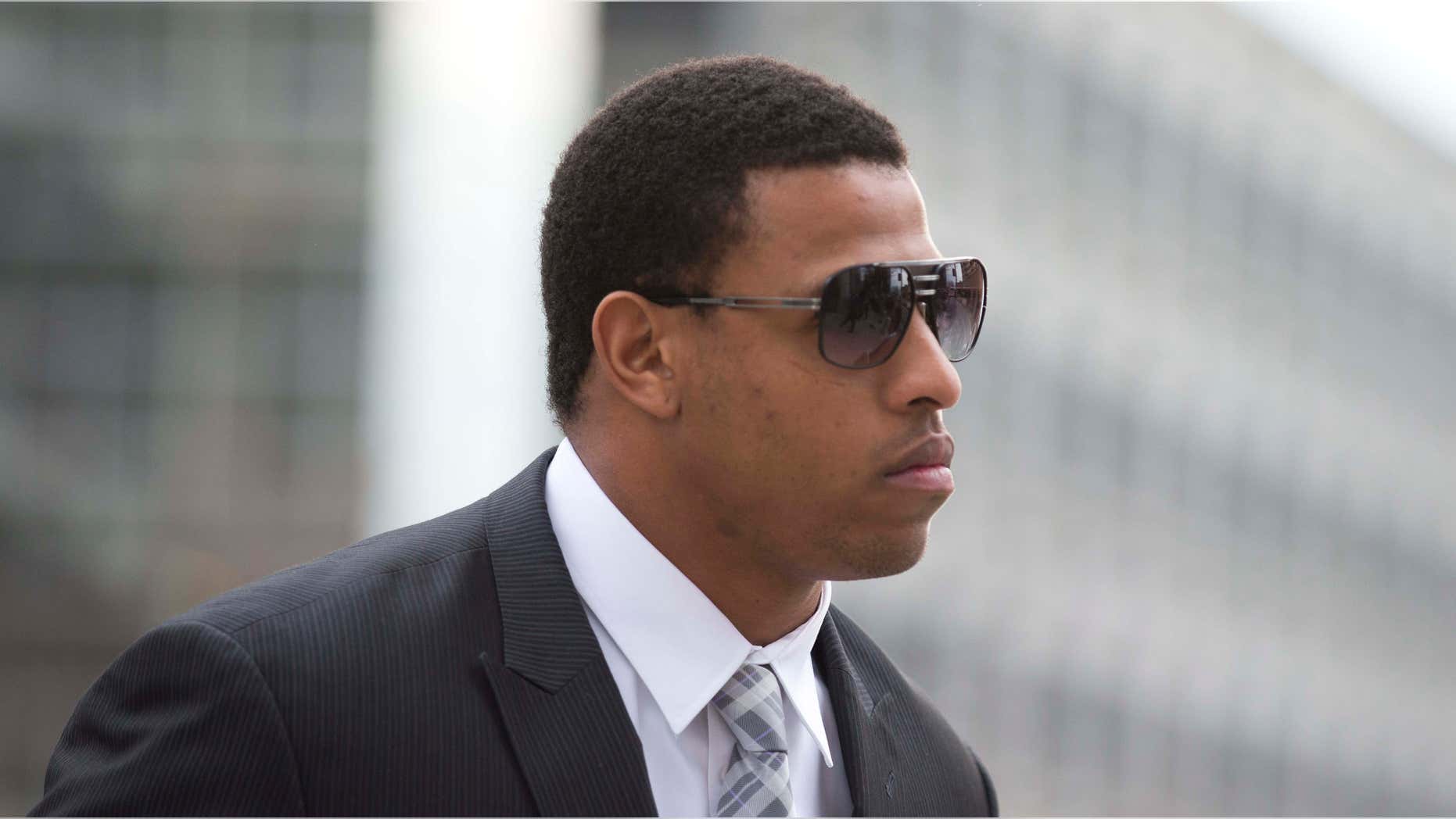 Feb. 9, 2015: Greg Hardy arrives at the Mecklenburg County Courthouse on the first day of his domestic violence appeal trial in Charlotte, N.C.
