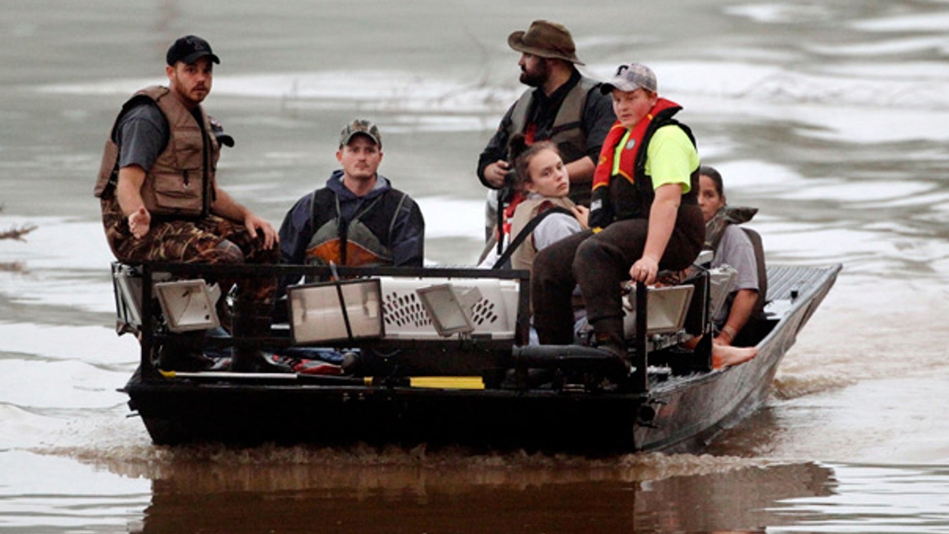 May 2: Evacuated residents are brought across flood waters in Nashville, Tenn.