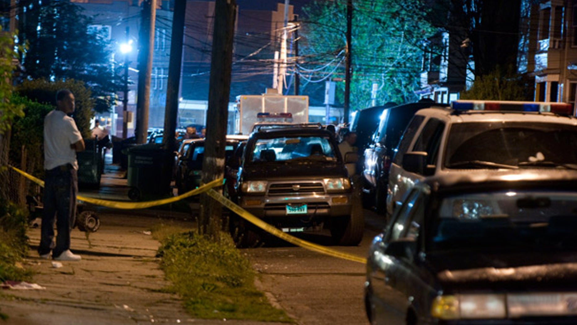 May 4: Police vehicles fill a street as officers search the home of the suspected Times Square bomber in Bridgeport, Conn.