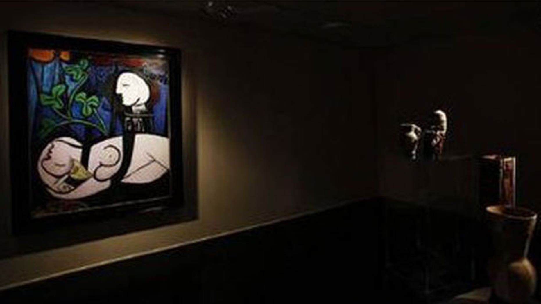 April 16: Pablo Picasso's 1932 'Nude, Green Leaves, and Bust' is seen at Christie's auction house in New York.