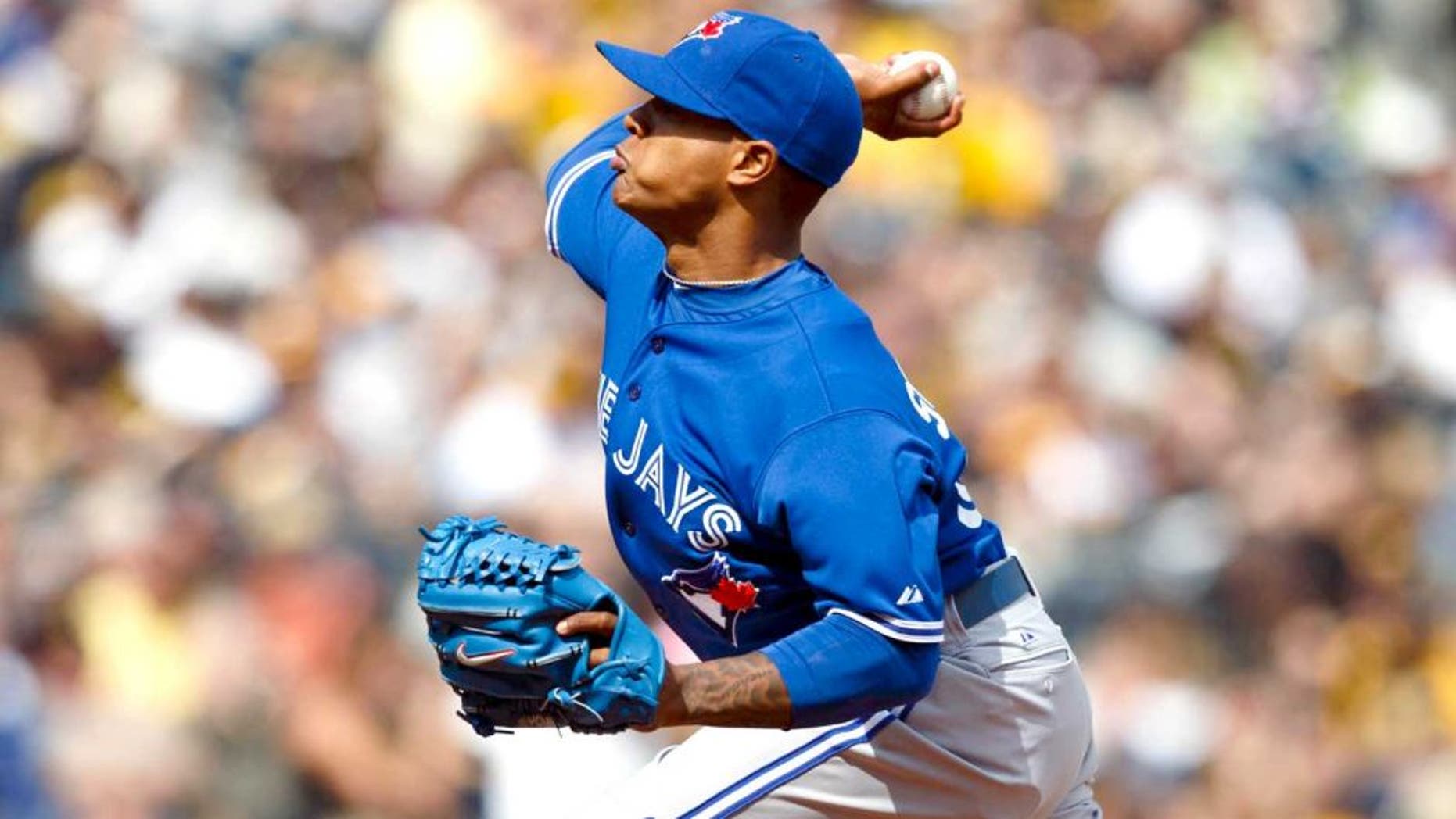 May 4, 2014; Pittsburgh, PA, USA; Toronto Blue Jays relief pitcher Marcus Stroman (54) pitches in the eighth inning against the Pittsburgh Pirates at PNC Park. Mandatory Credit: Rick Osentoski-USA TODAY Sports